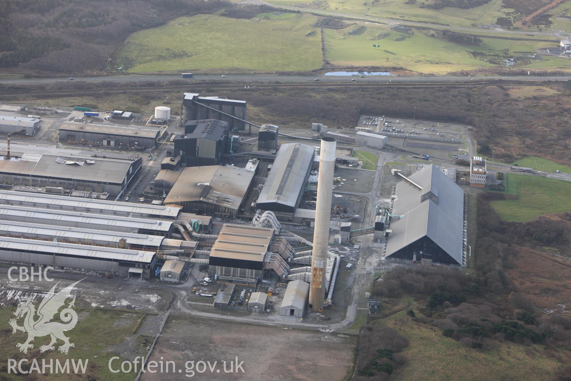 RCAHMW colour oblique photograph of Anglesey Aluminium Smelting Works, aerial survey prior to closure. Taken by Toby Driver on 13/01/2012.