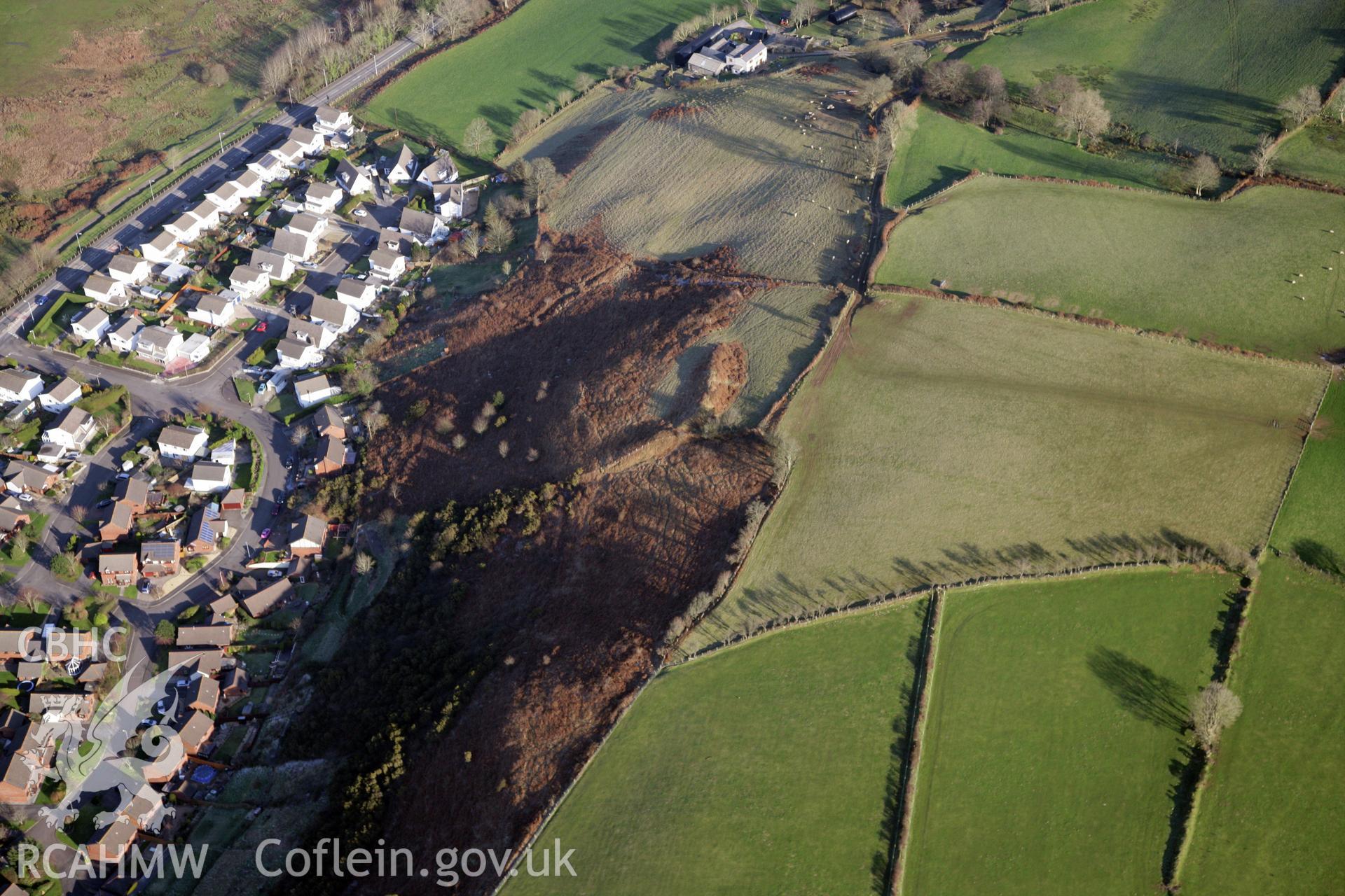 RCAHMW colour oblique photograph of Dan-Y-Lan Mound (Hen Gastell). Taken by Toby Driver on 02/02/2012.