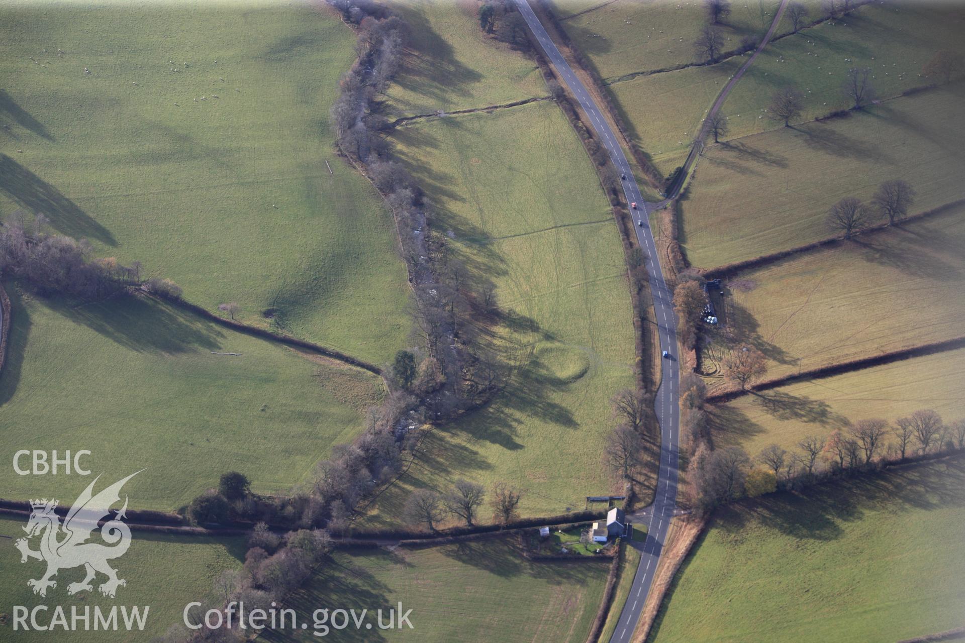 RCAHMW colour oblique photograph of Pont Estyll ringwork. Taken by Toby Driver on 23/11/2012.