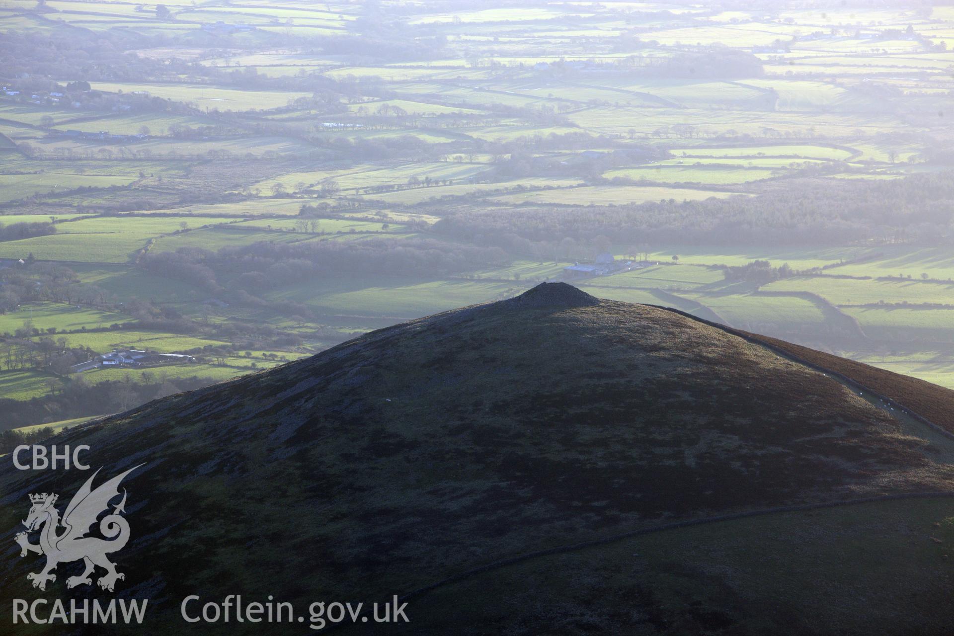 RCAHMW colour oblique photograph of Yr Eifl summit cairns. Taken by Toby Driver on 10/12/2012.