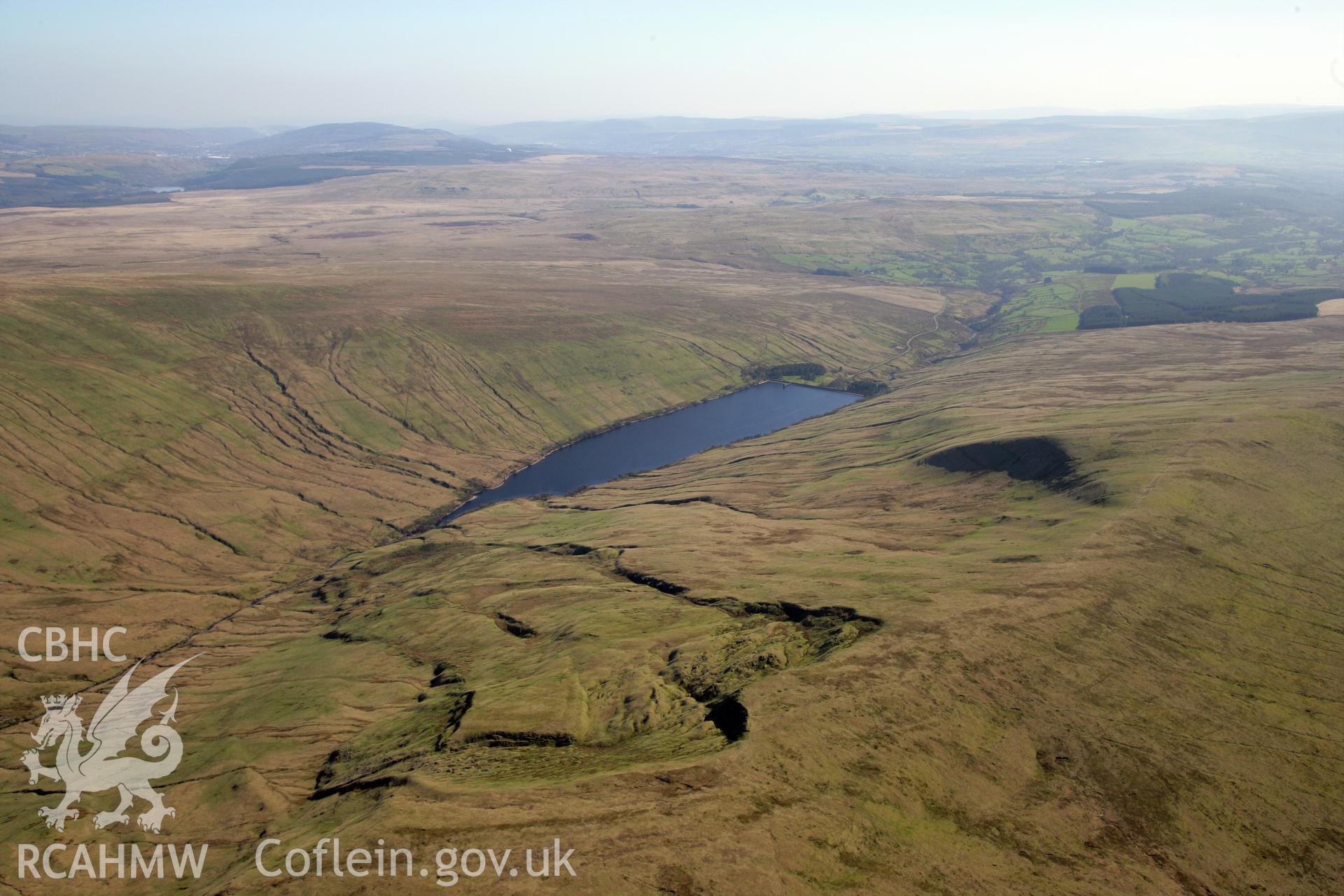 RCAHMW colour oblique photograph of Ystradfellte Reservoir, upland landscape looking south. Taken by Toby Driver and Oliver Davies on 28/03/2012.