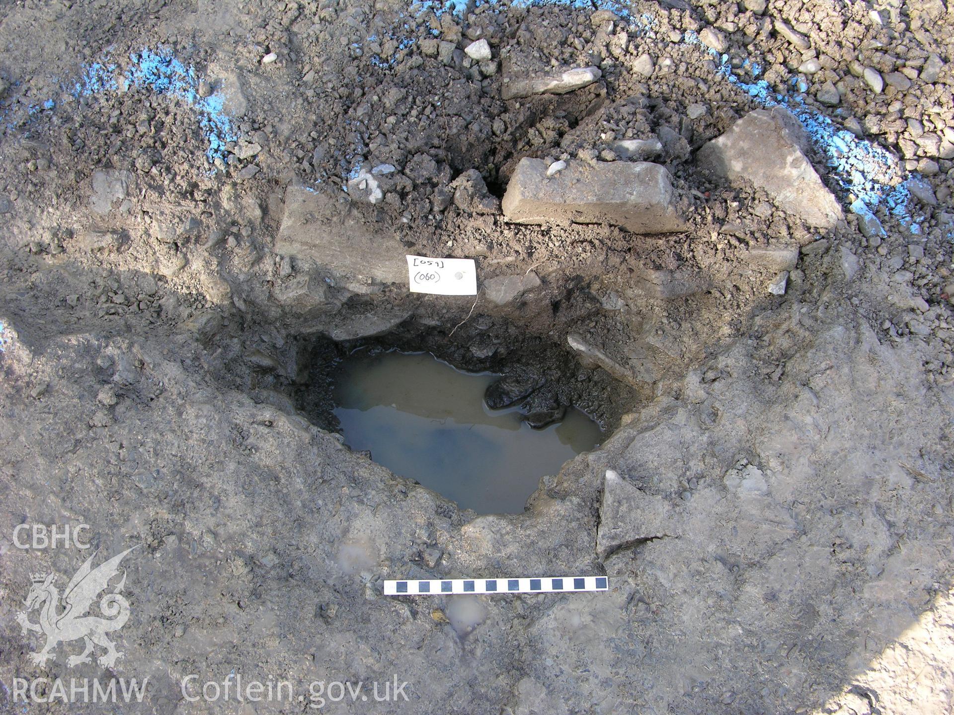 Colour digital photograph showing view of post medieval posthole from southern alignment - part of the Archaeological Excavation report for Horse Yard Farm, Evenjobb (CAP Report 607) by Chris E Smith, from a Cambrian Archaeological Projects assessment survey.
