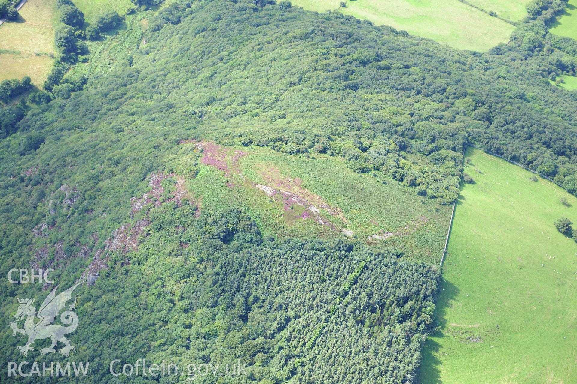 RCAHMW colour oblique photograph of Maes-y-Gaer hill fort, viewed from the south-east. Taken by Toby Driver on 10/08/2012.