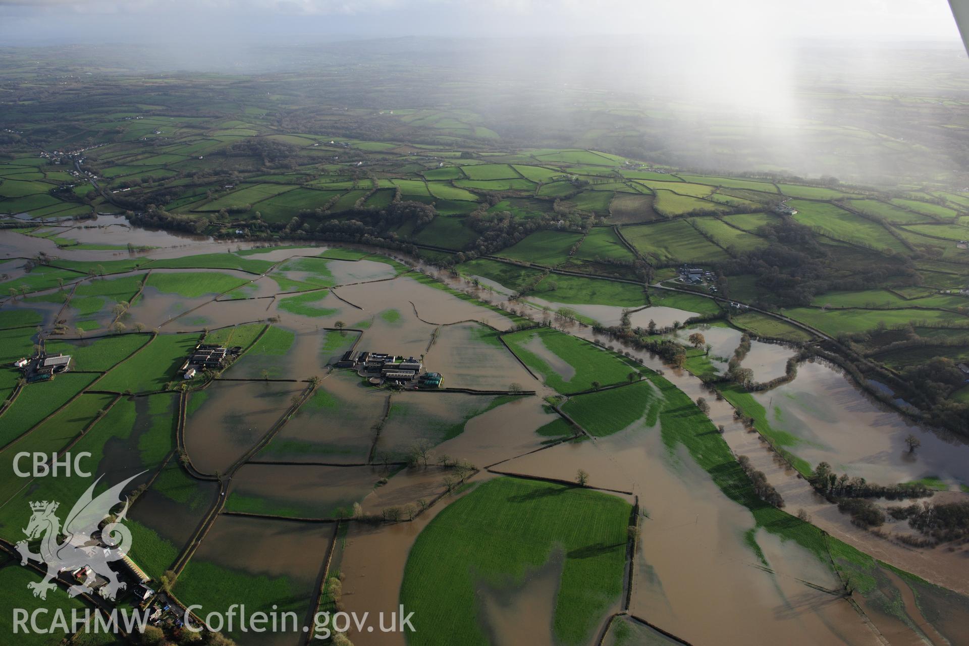 RCAHMW colour oblique photograph of Glantowy Fawr farm, with flooding, view from west. Taken by Toby Driver on 23/11/2012.