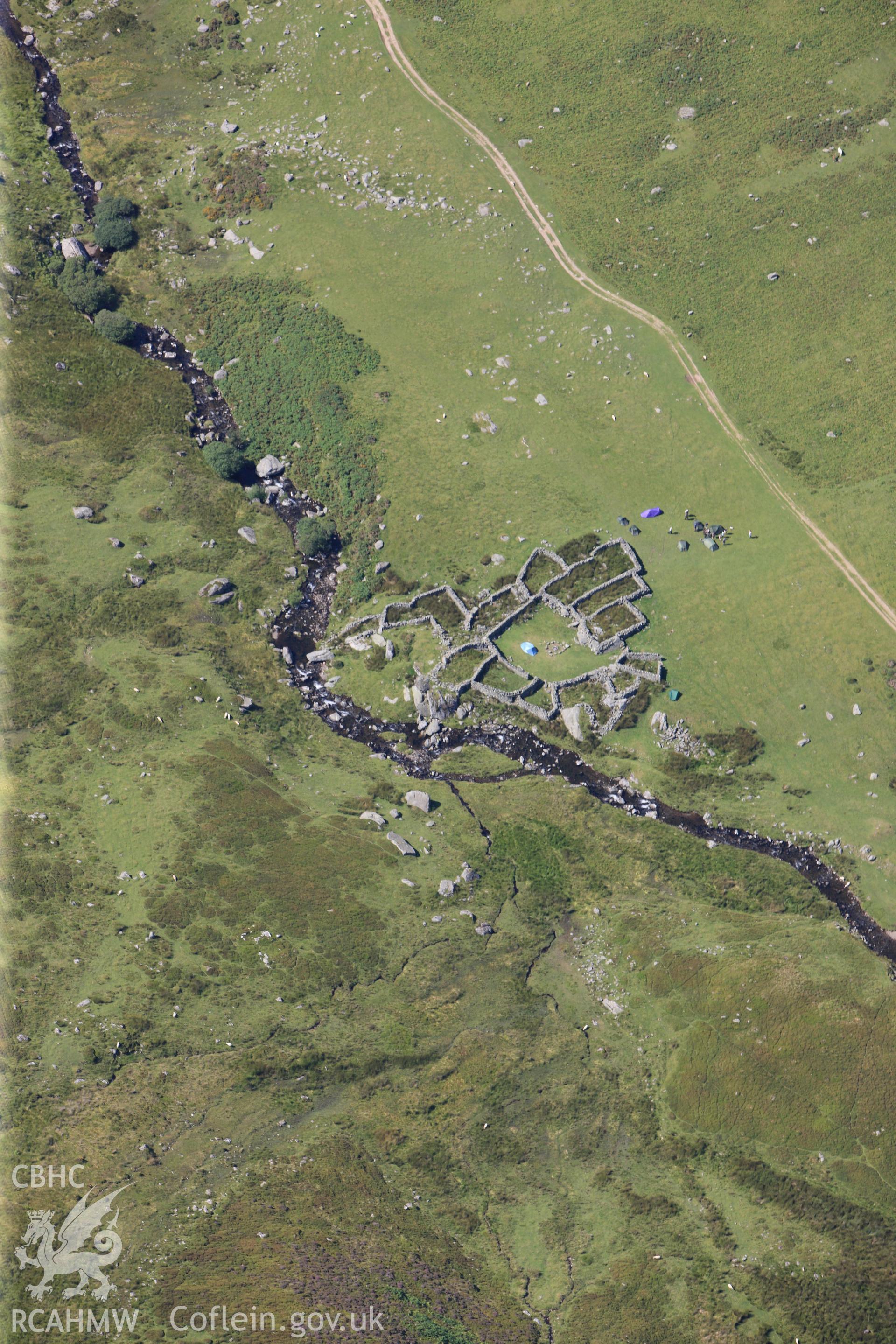 RCAHMW colour oblique photograph of sheepfold, Afon Goch, viewed from the south-west. Taken by Toby Driver on 10/08/2012.