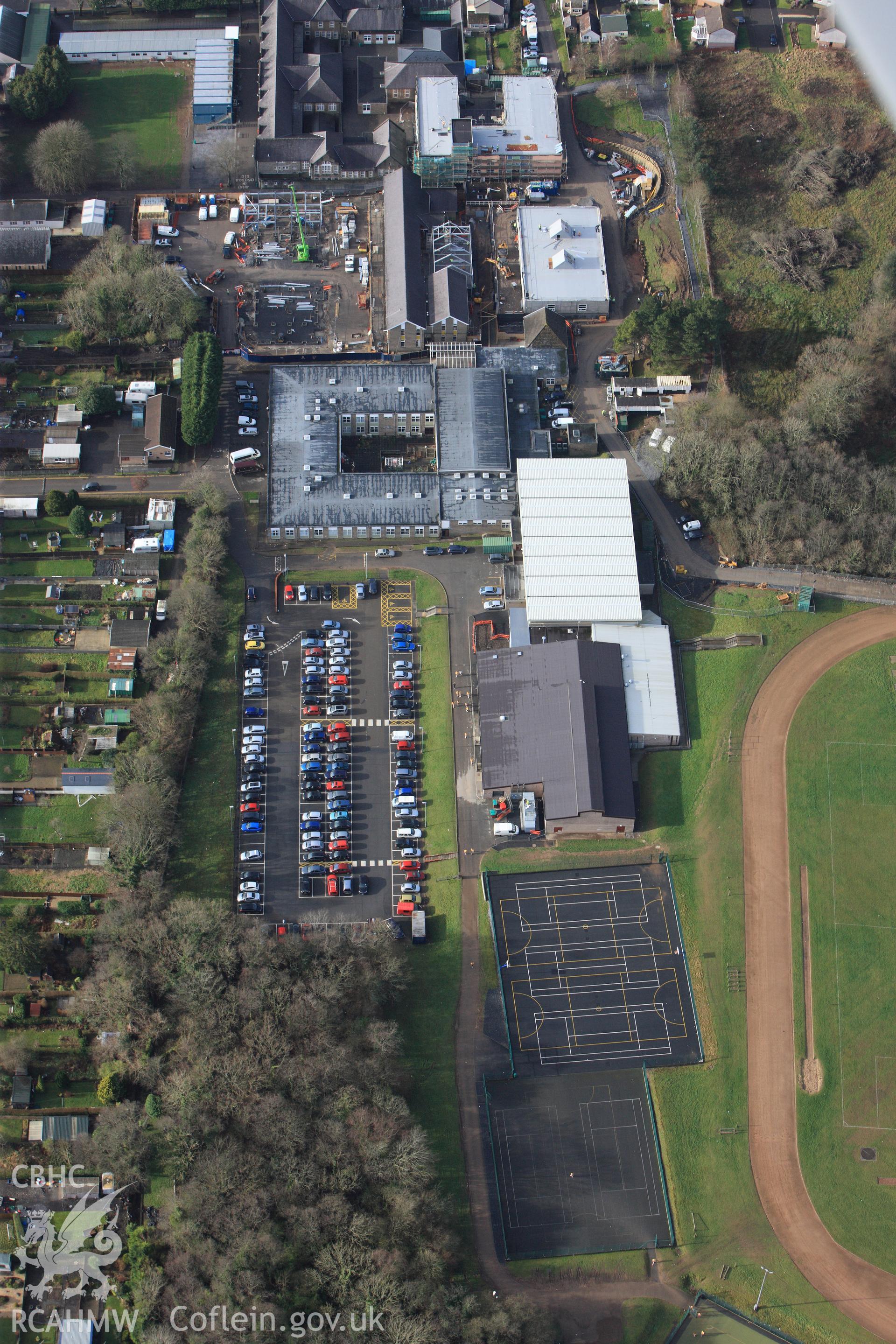 RCAHMW colour oblique photograph of Amman Valley Intermediate School, Ammanford. Taken by Toby Driver on 27/01/2012.