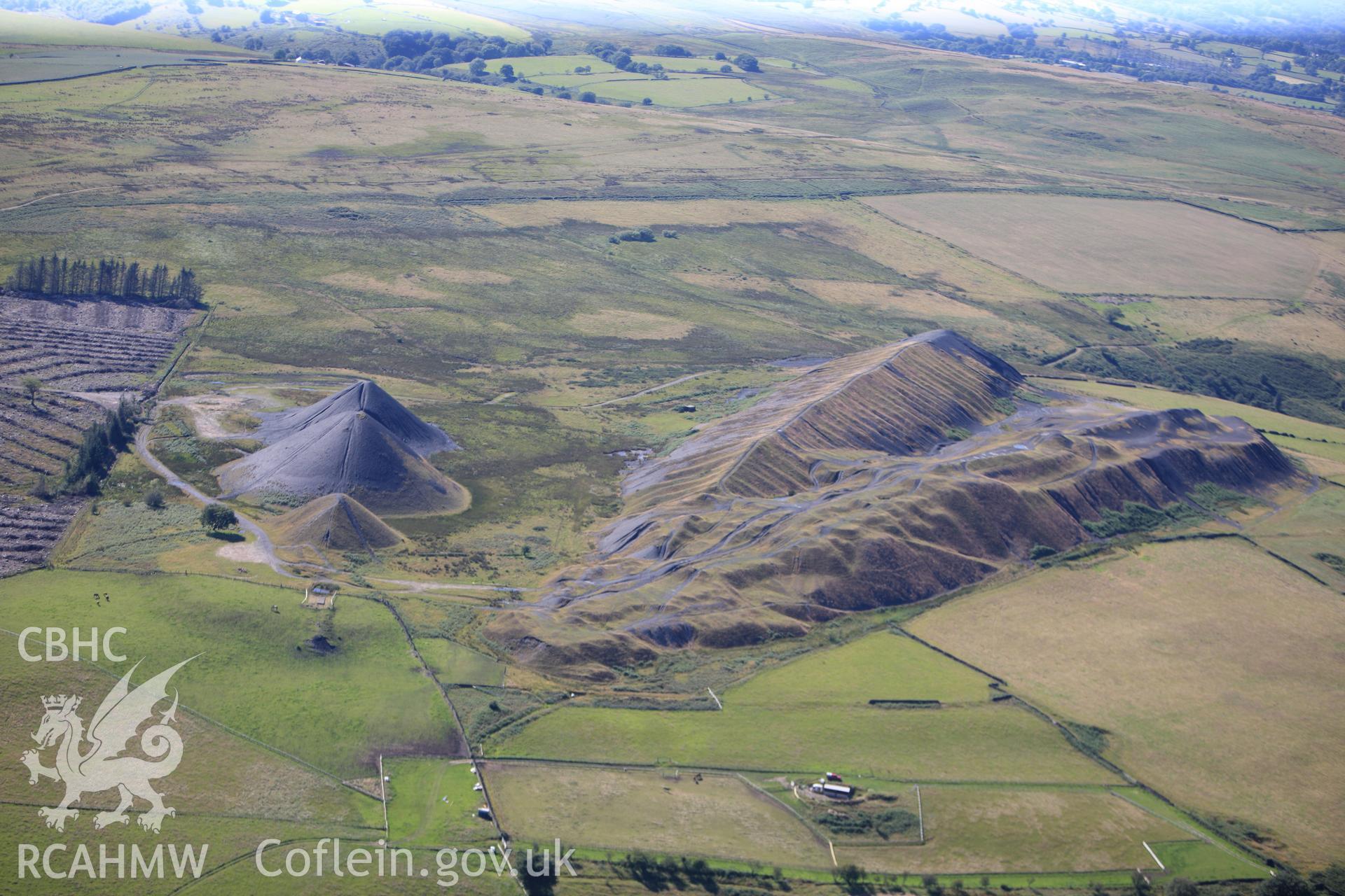 RCAHMW colour oblique photograph of Llanbradach Colliery spoil tips. Taken by Toby Driver on 24/07/2012.