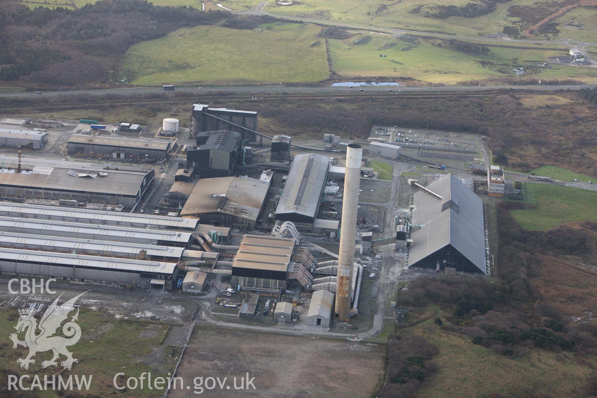 RCAHMW colour oblique photograph of Anglesey Aluminium Smelting Works, aerial survey prior to closure. Taken by Toby Driver on 13/01/2012.