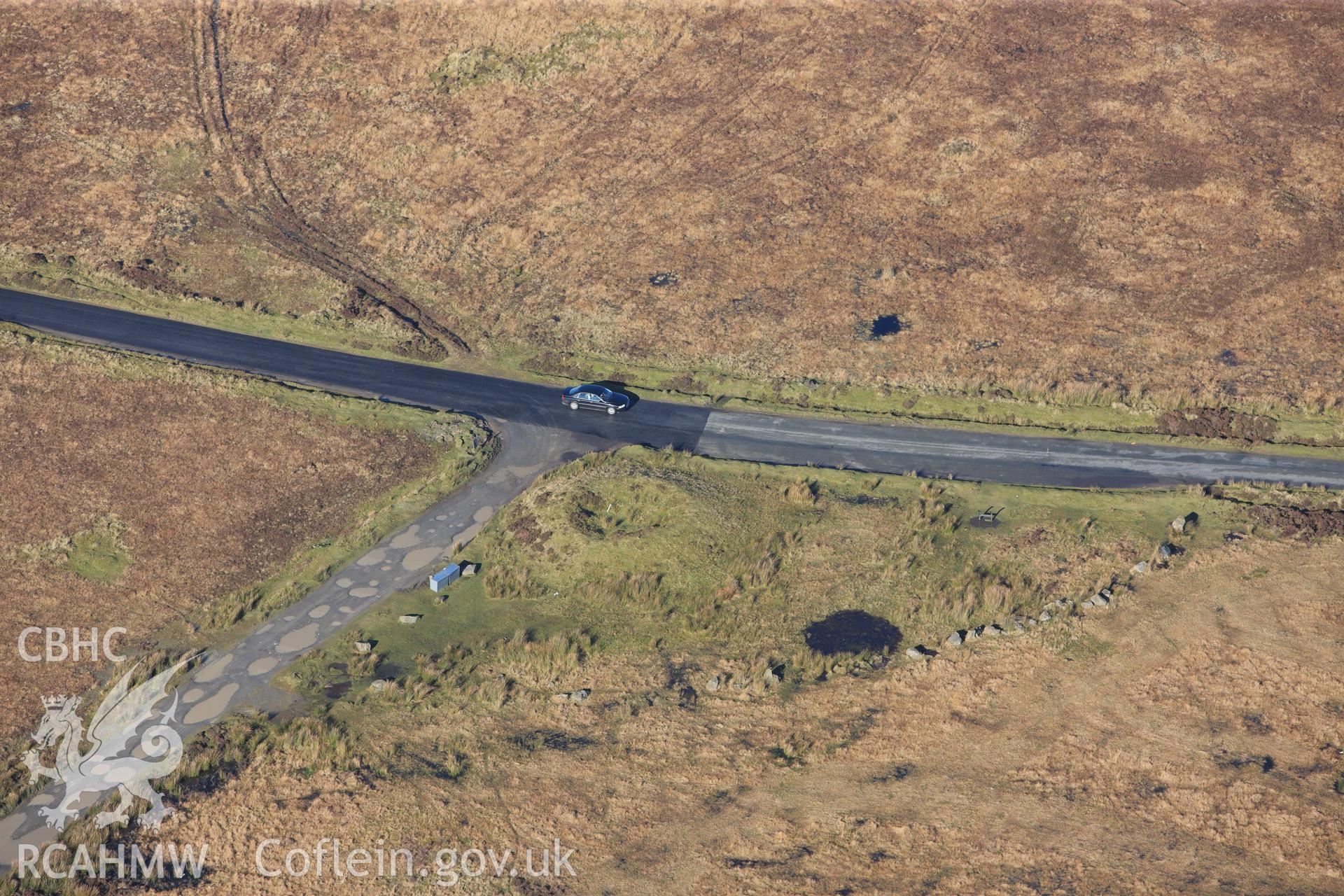 RCAHMW colour oblique photograph of Crug y Biswal, round cairns. Taken by Toby Driver on 05/11/2012.