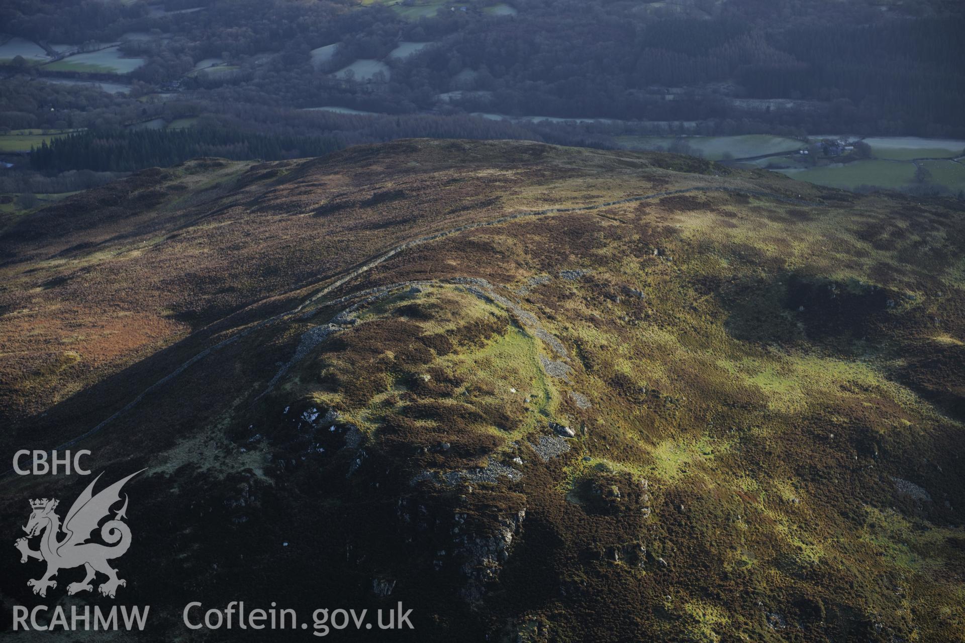 RCAHMW colour oblique photograph of Moel Offrwm, hillfort. Taken by Toby Driver on 10/12/2012.