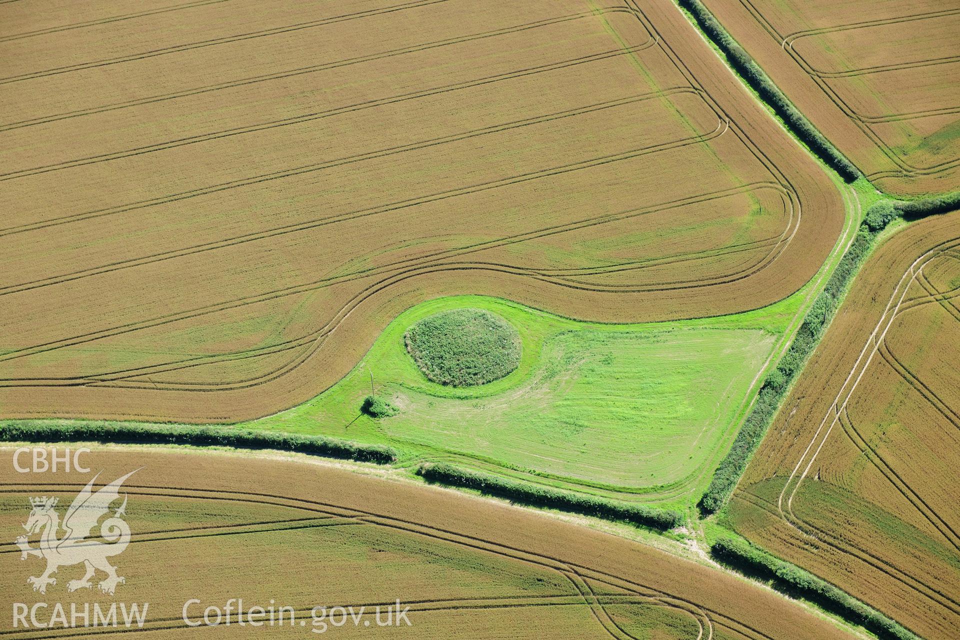 RCAHMW colour oblique photograph of Mynydd Herbert round barrow. Taken by Toby Driver on 24/07/2012.