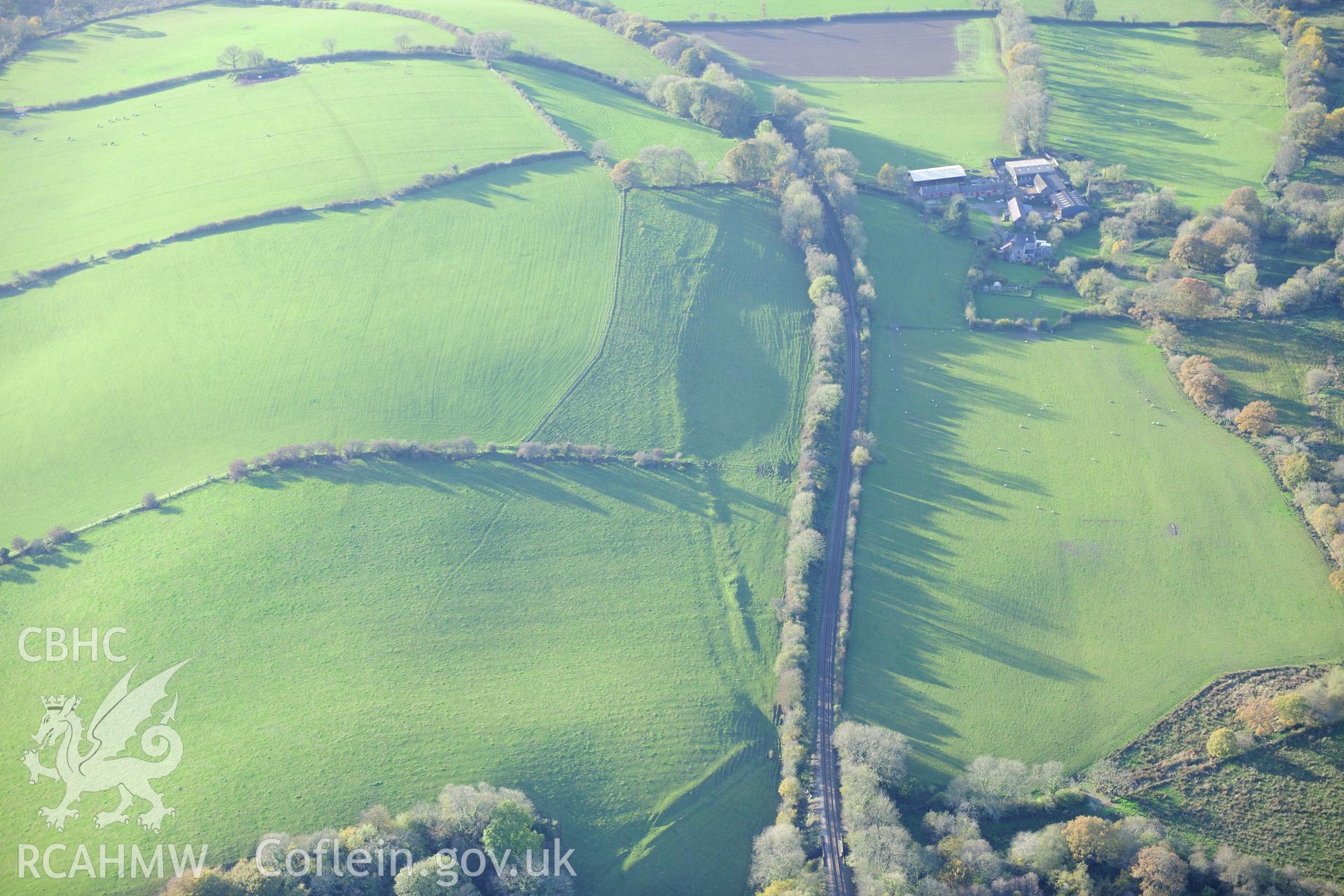 RCAHMW colour oblique photograph of Llangwathan Castle. Taken by Toby Driver on 26/10/2012.