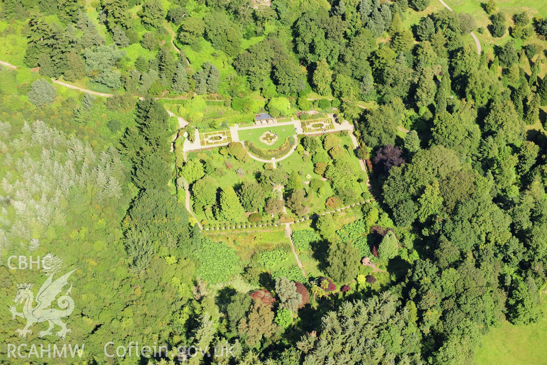 RCAHMW colour oblique photograph of Penrhyn Castle garden and walled flower garden, viewed from the north-east. Taken by Toby Driver on 10/08/2012.