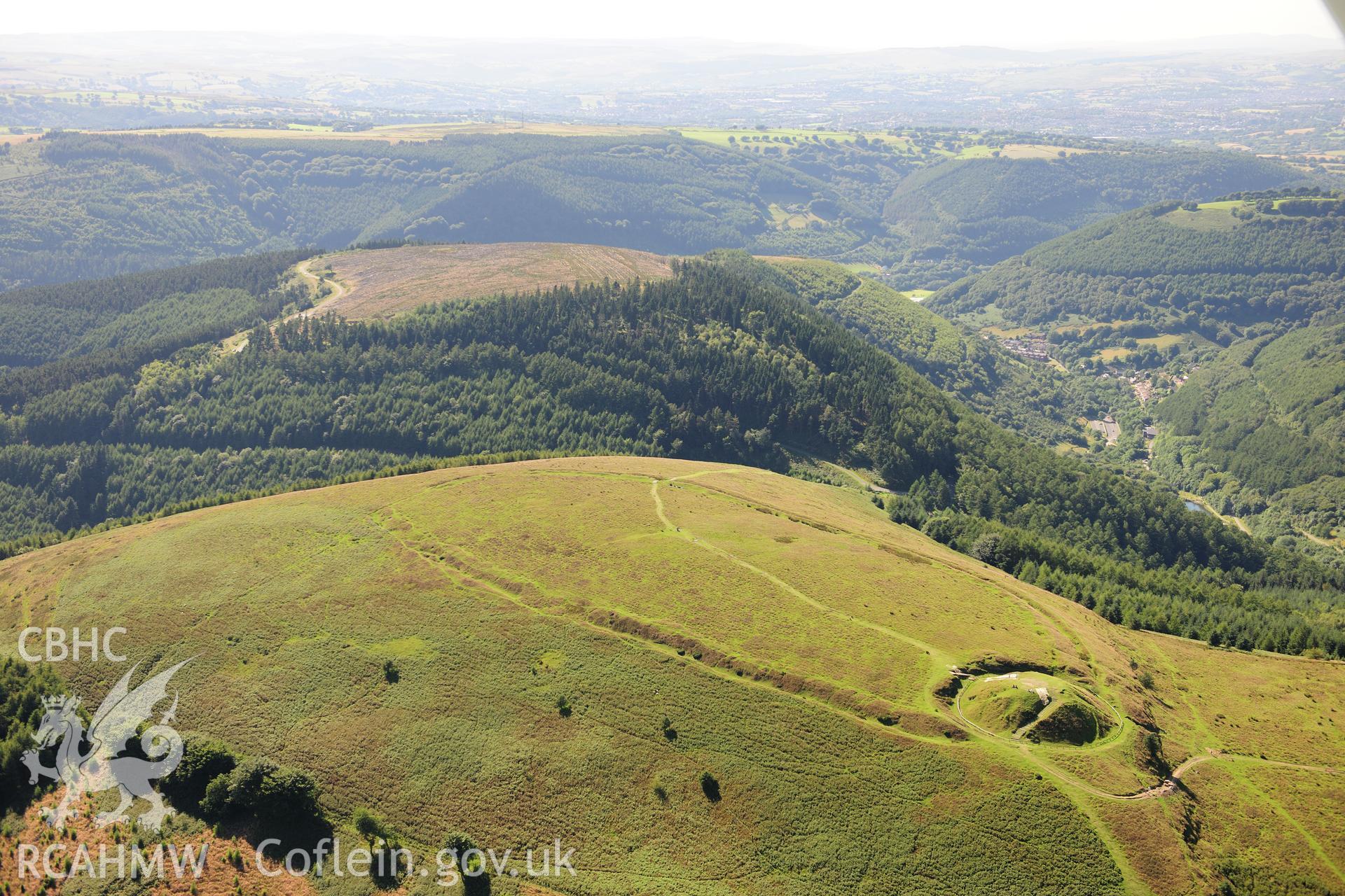 RCAHMW colour oblique photograph of Twmbarlwm, Castle and hillfort. Taken by Toby Driver on 24/07/2012.