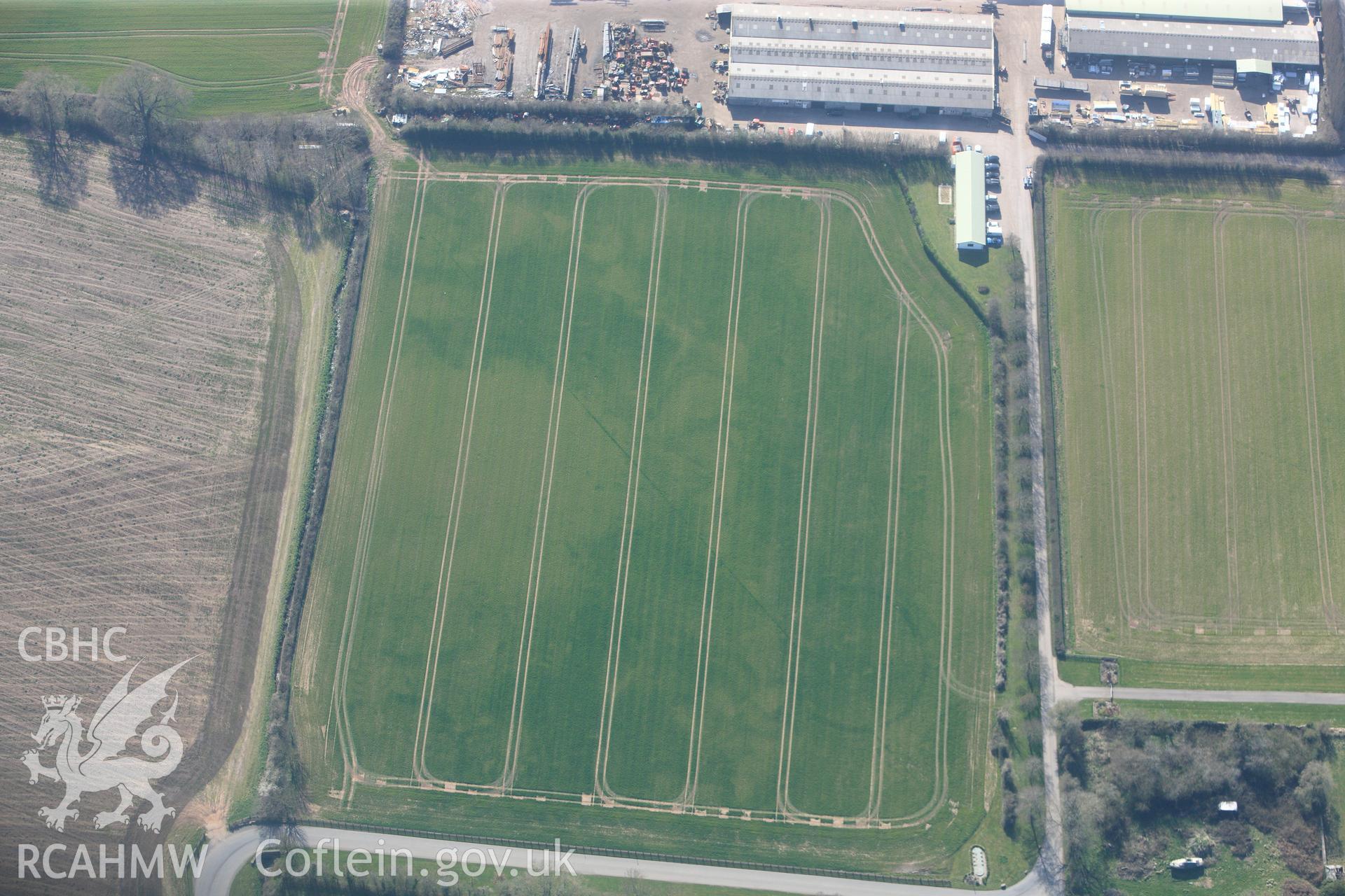 RCAHMW colour oblique photograph of Llancayo Farm barrow cemetery, southern cluster. Taken by Toby Driver and Oliver Davies on 28/03/2012.