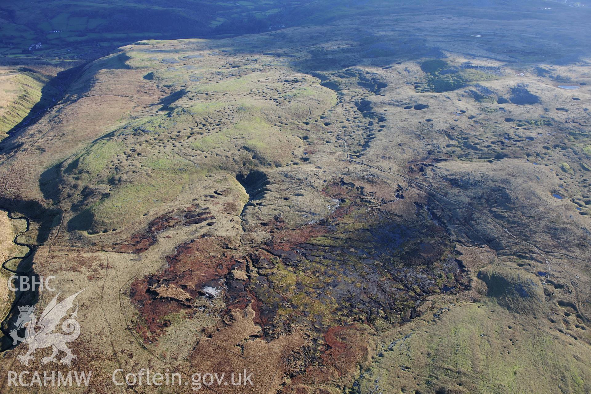 RCAHMW colour oblique photograph of Waun Fignen Felen, peat bog. Taken by Toby Driver on 28/11/2012.
