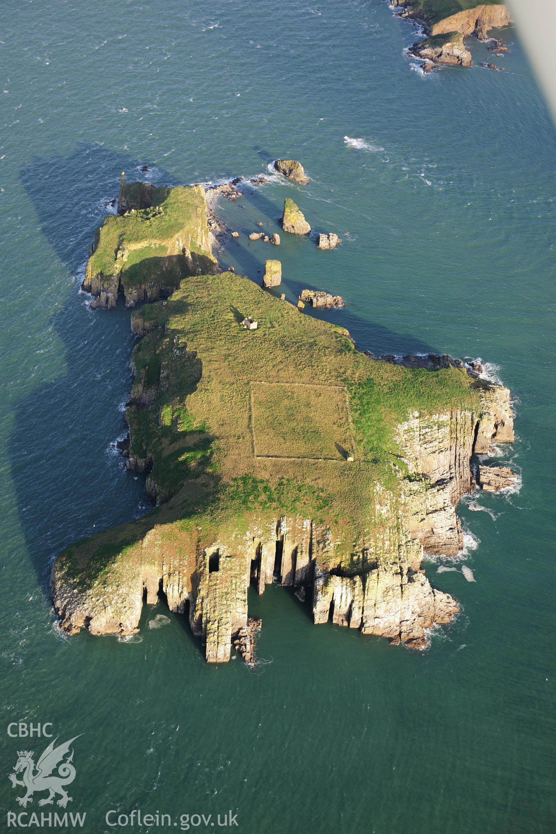 RCAHMW colour oblique photograph of Chapel ruins and field enclosure, St Margaret's Island. Taken by Toby Driver on 26/10/2012.