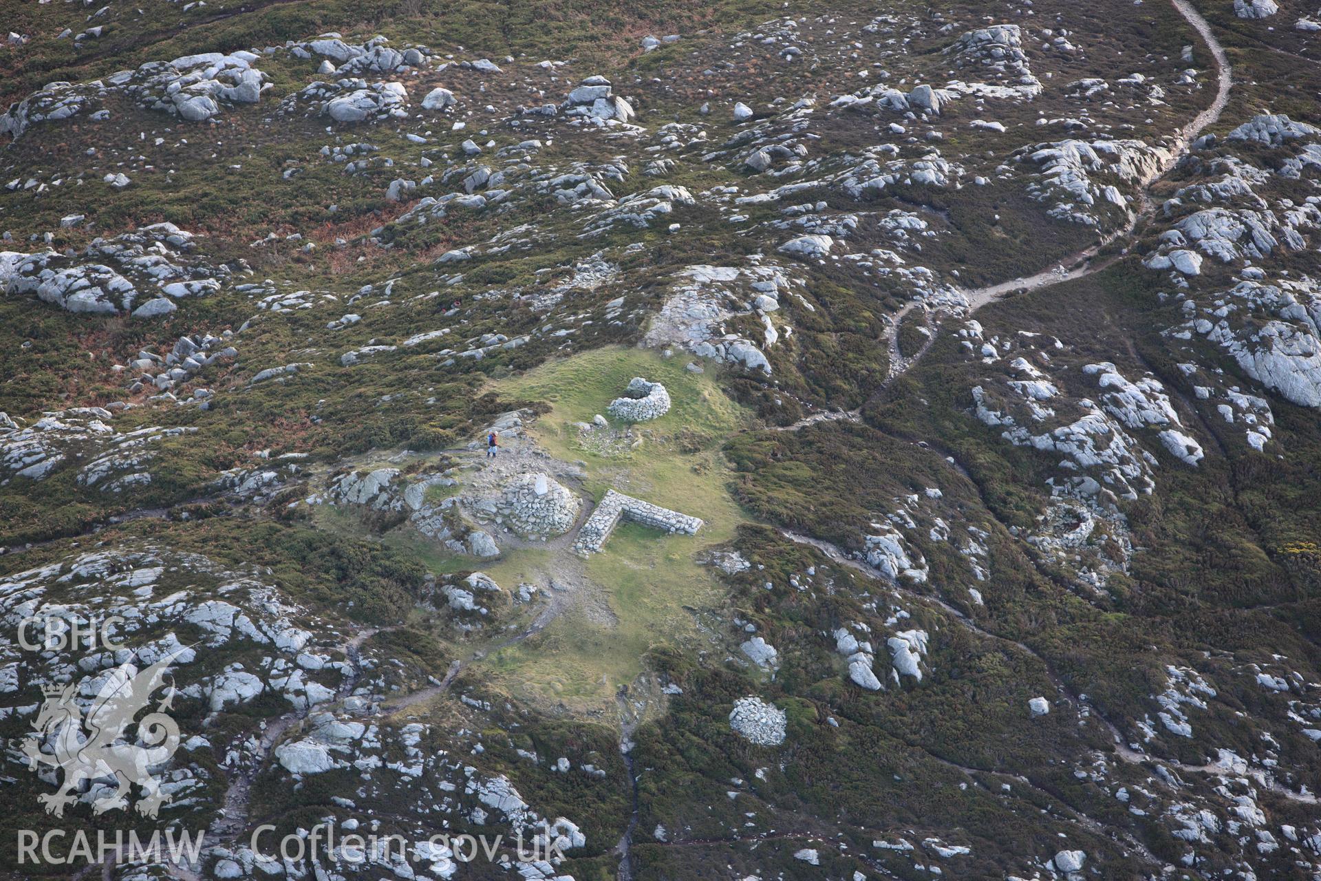 RCAHMW colour oblique photograph of Caer y Twr hillfort, Holyhead Mountain, Roman watch tower. Taken by Toby Driver on 13/01/2012.