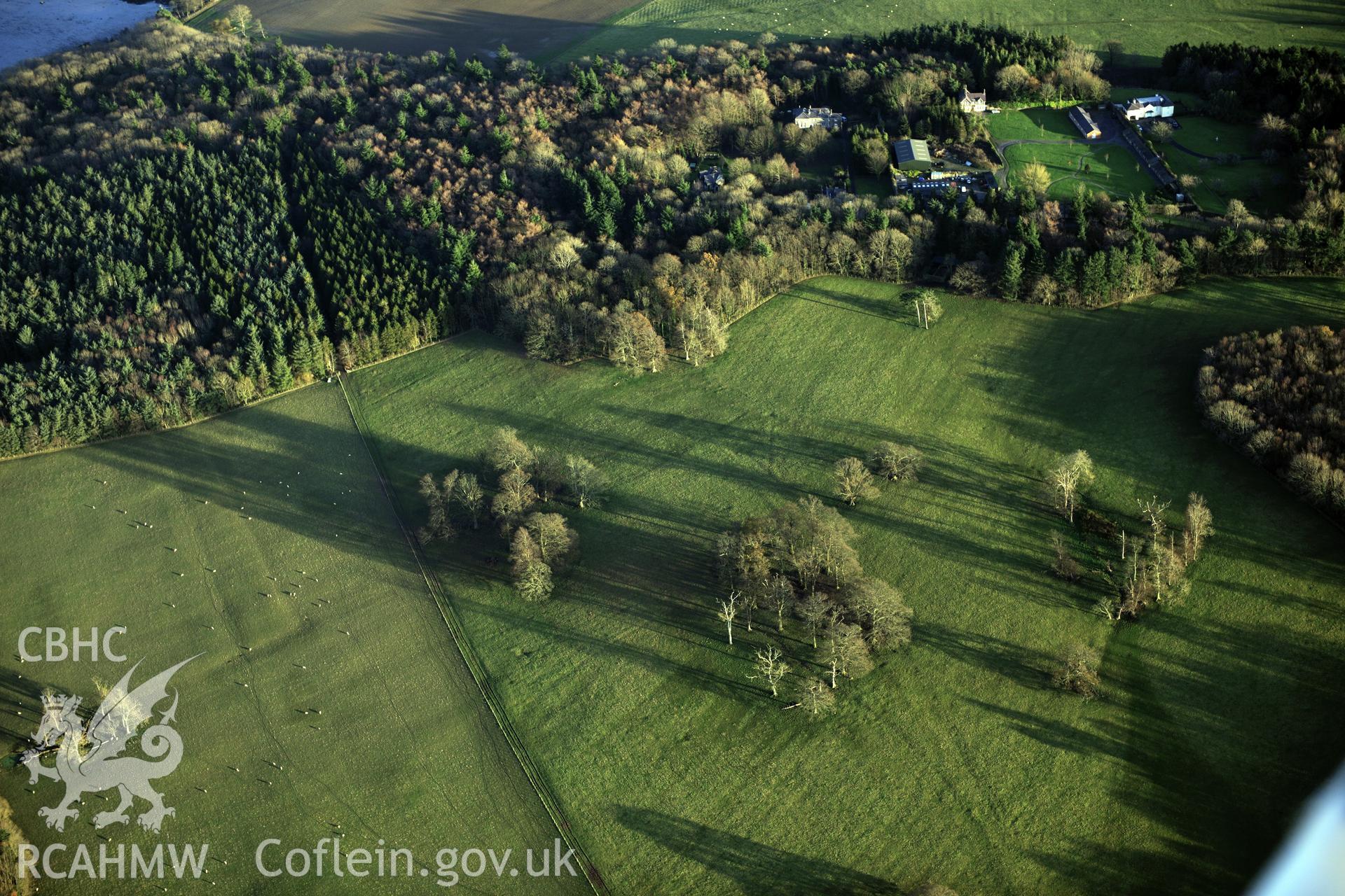 RCAHMW colour oblique photograph of Penrhyn Park earthworks, earthworks in north part of parkland. Taken by Toby Driver on 10/12/2012.