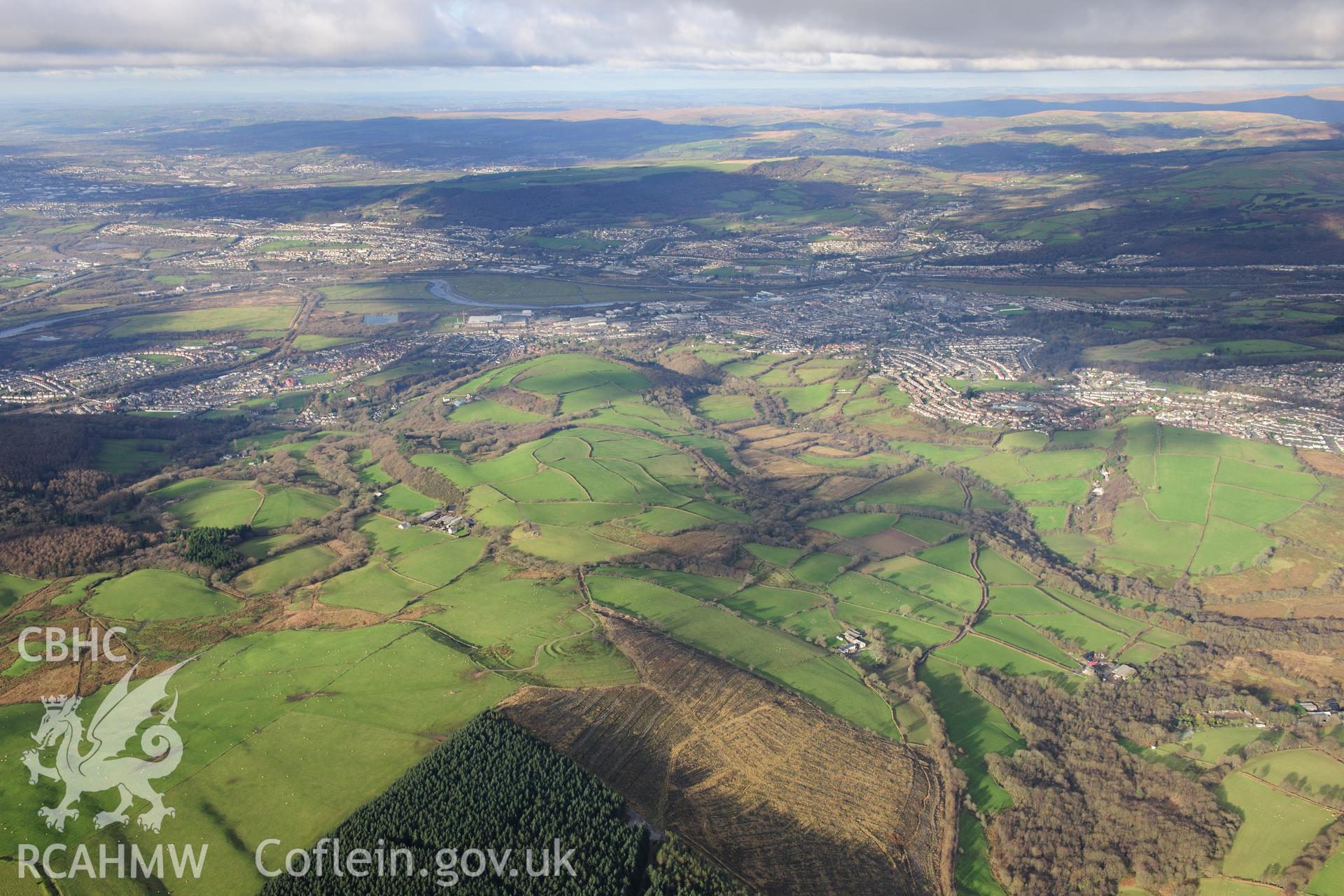 RCAHMW colour oblique photograph of Gaer Fawr, wide landscape view looking west. Taken by Toby Driver on 28/11/2012.