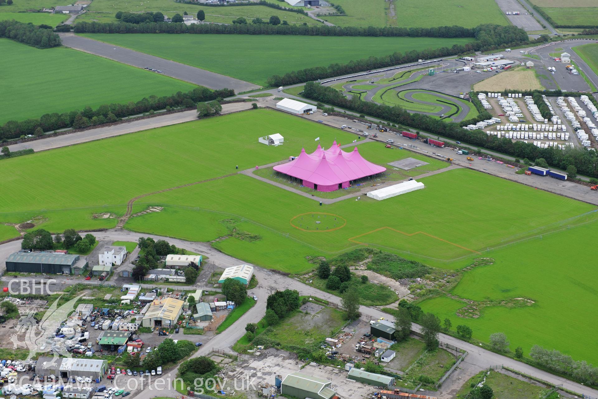 RCAHMW colour oblique photograph of Llandow Airfield 2012 National Eisteddfod. Taken by Toby Driver on 05/07/2012.