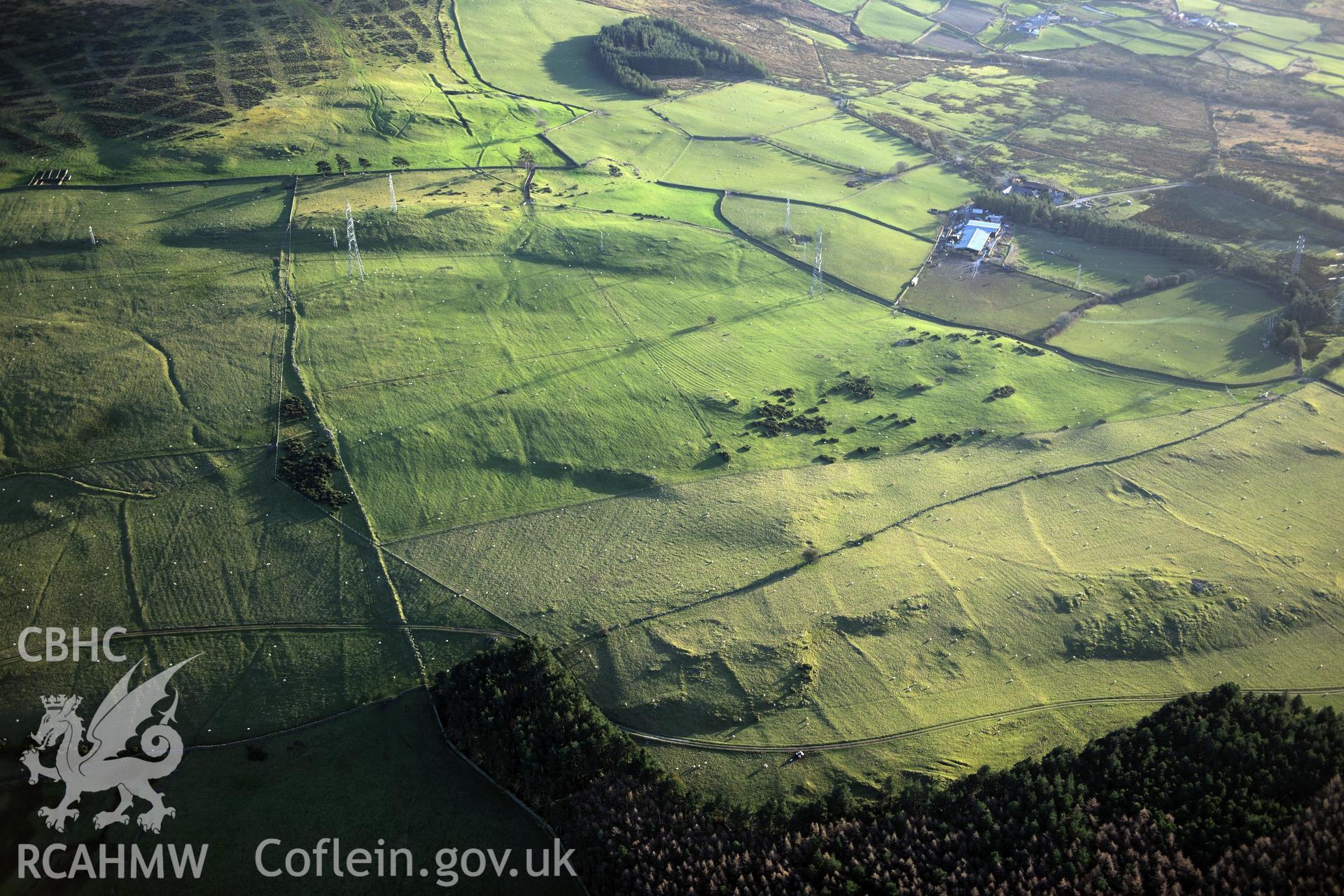 RCAHMW colour oblique photograph of Bronydd Isaf, settlement and field system. Taken by Toby Driver on 10/12/2012.