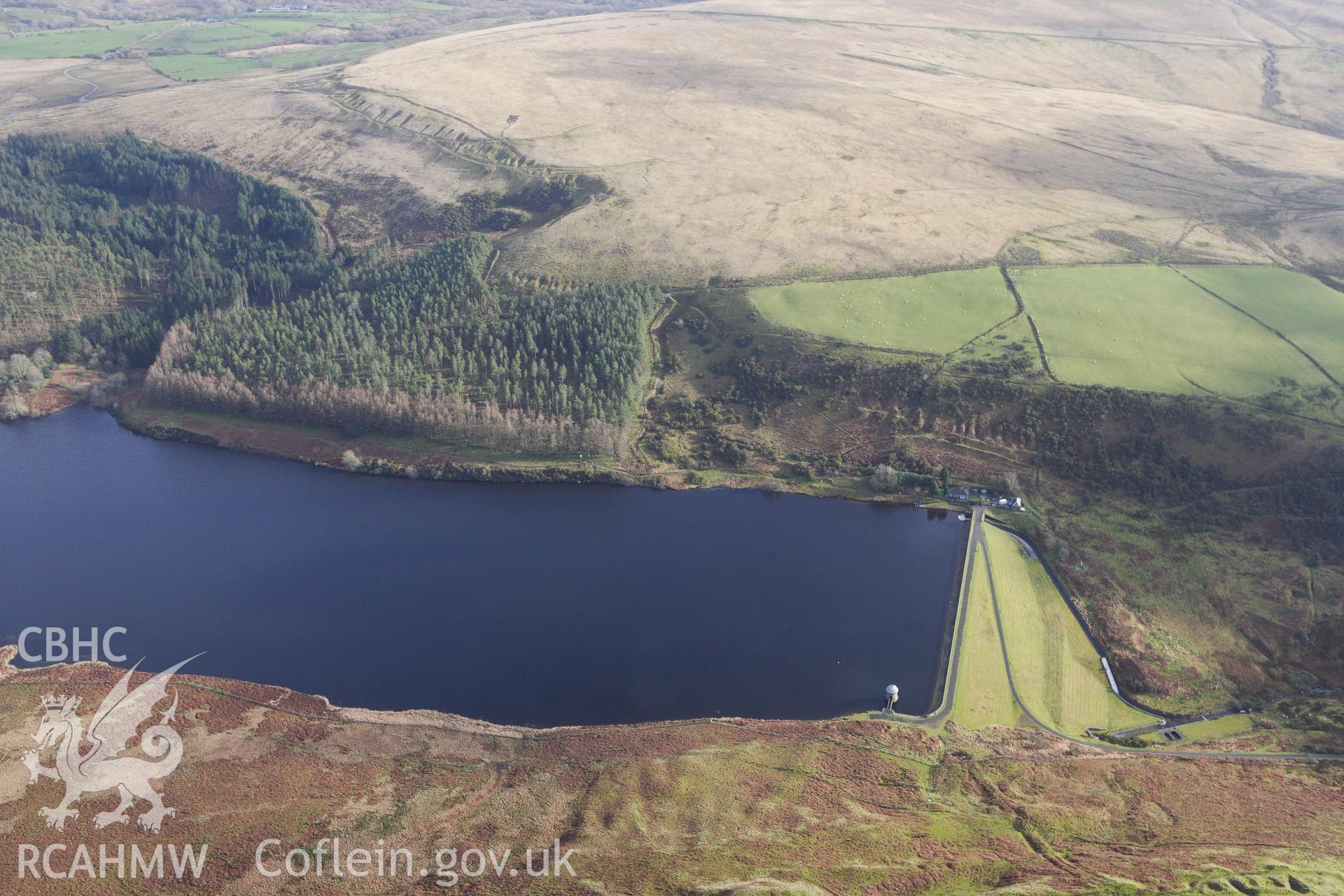 RCAHMW colour oblique photograph of Upper Lliw reservoir, with the valve house. Taken by Toby Driver on 27/01/2012.