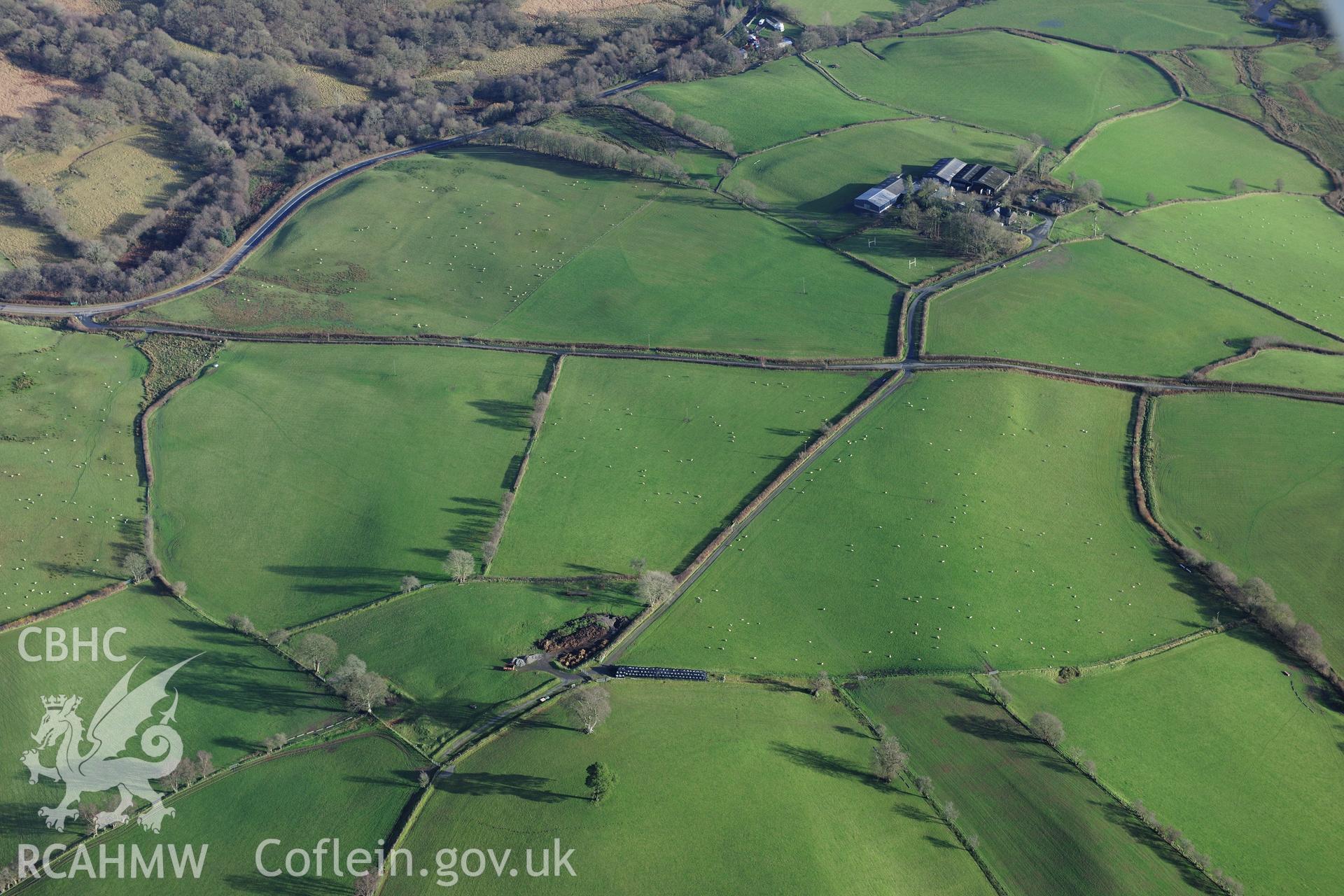 RCAHMW colour oblique photograph of Roman camp west of Caerau Roman fort, view of location of cropmark site from the west. Taken by Toby Driver on 23/11/2012.