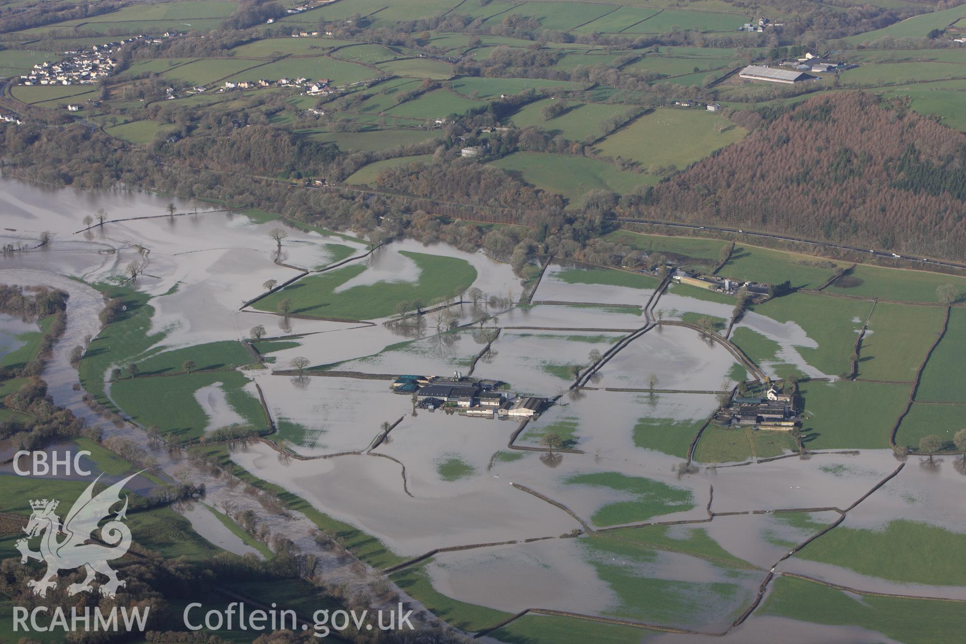 RCAHMW colour oblique photograph of Glantowy Fawr farm, with flooding, view from south. Taken by Toby Driver on 23/11/2012.
