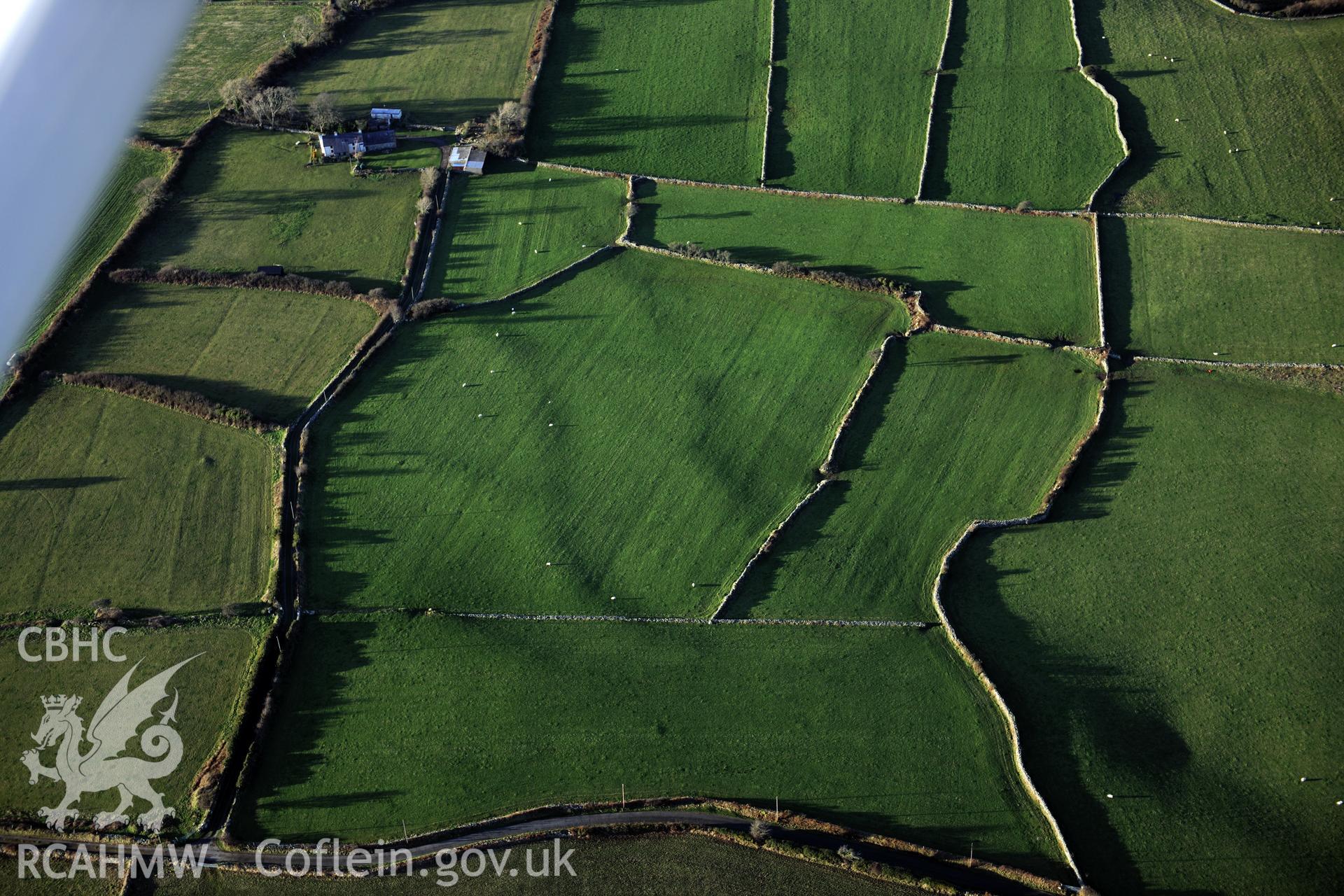RCAHMW colour oblique photograph of Tyddyn Whisgin Bach early field system. Taken by Toby Driver on 10/12/2012.