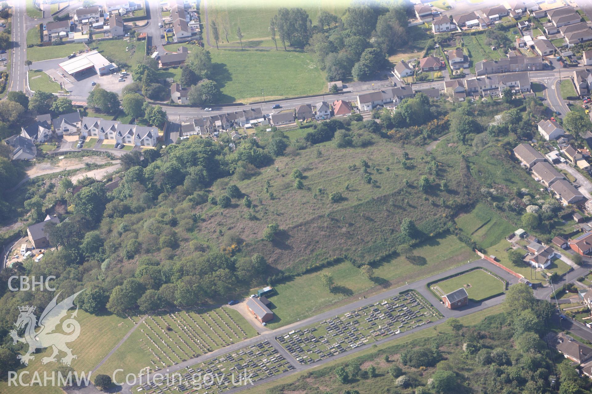 RCAHMW colour oblique photograph of General view of Y Gaer hillfort, looking south. Taken by Toby Driver on 24/05/2012.