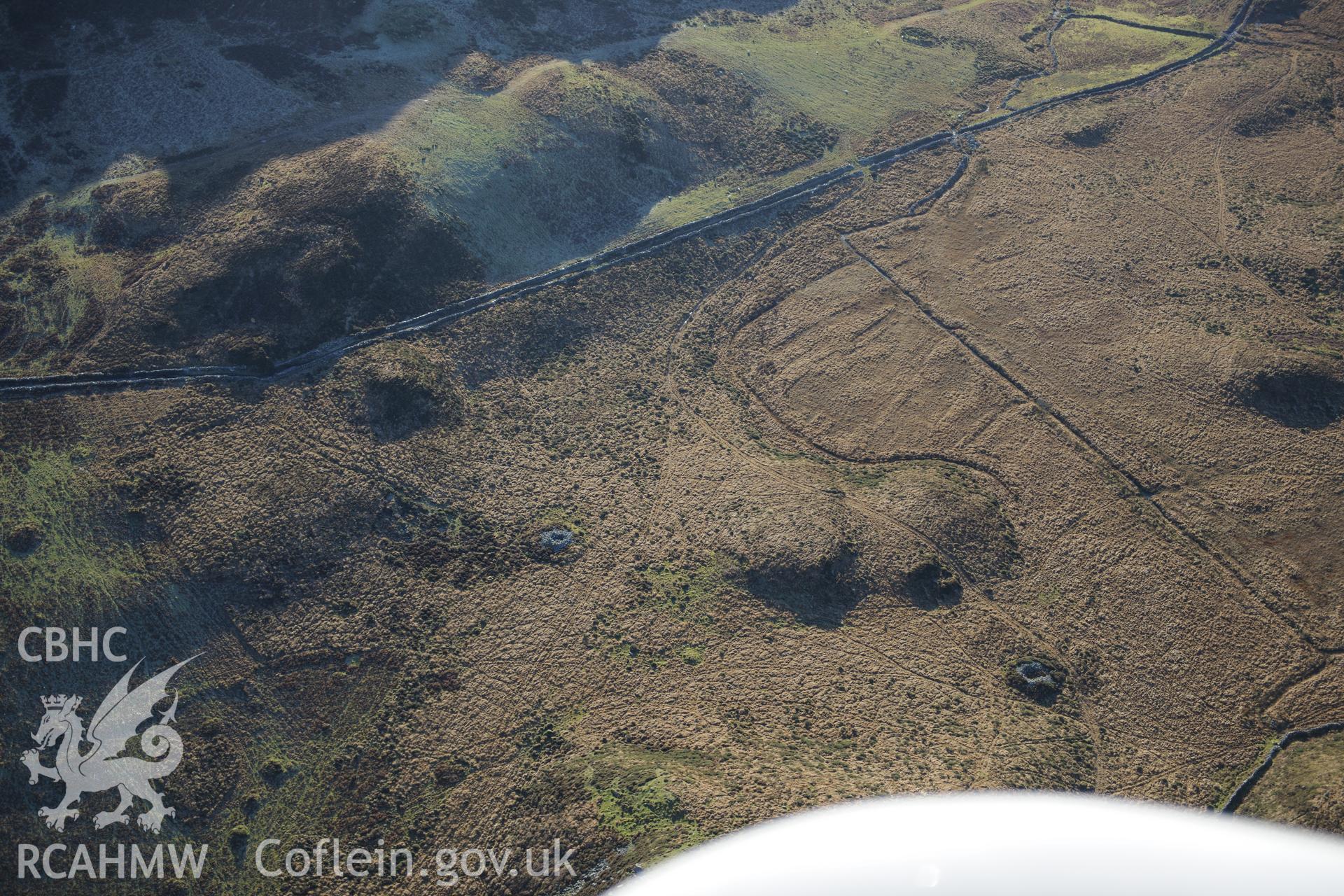 RCAHMW colour oblique photograph of Tal y Waen cairns. Taken by Toby Driver on 10/12/2012.