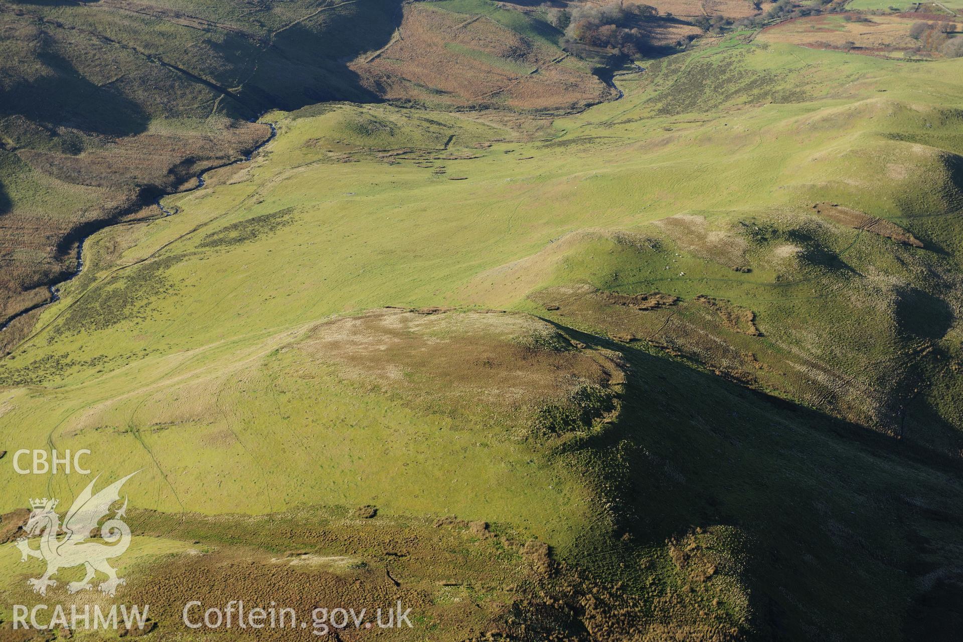 RCAHMW colour oblique photograph of Castell Rhyfel, hillfort. Taken by Toby Driver on 05/11/2012.