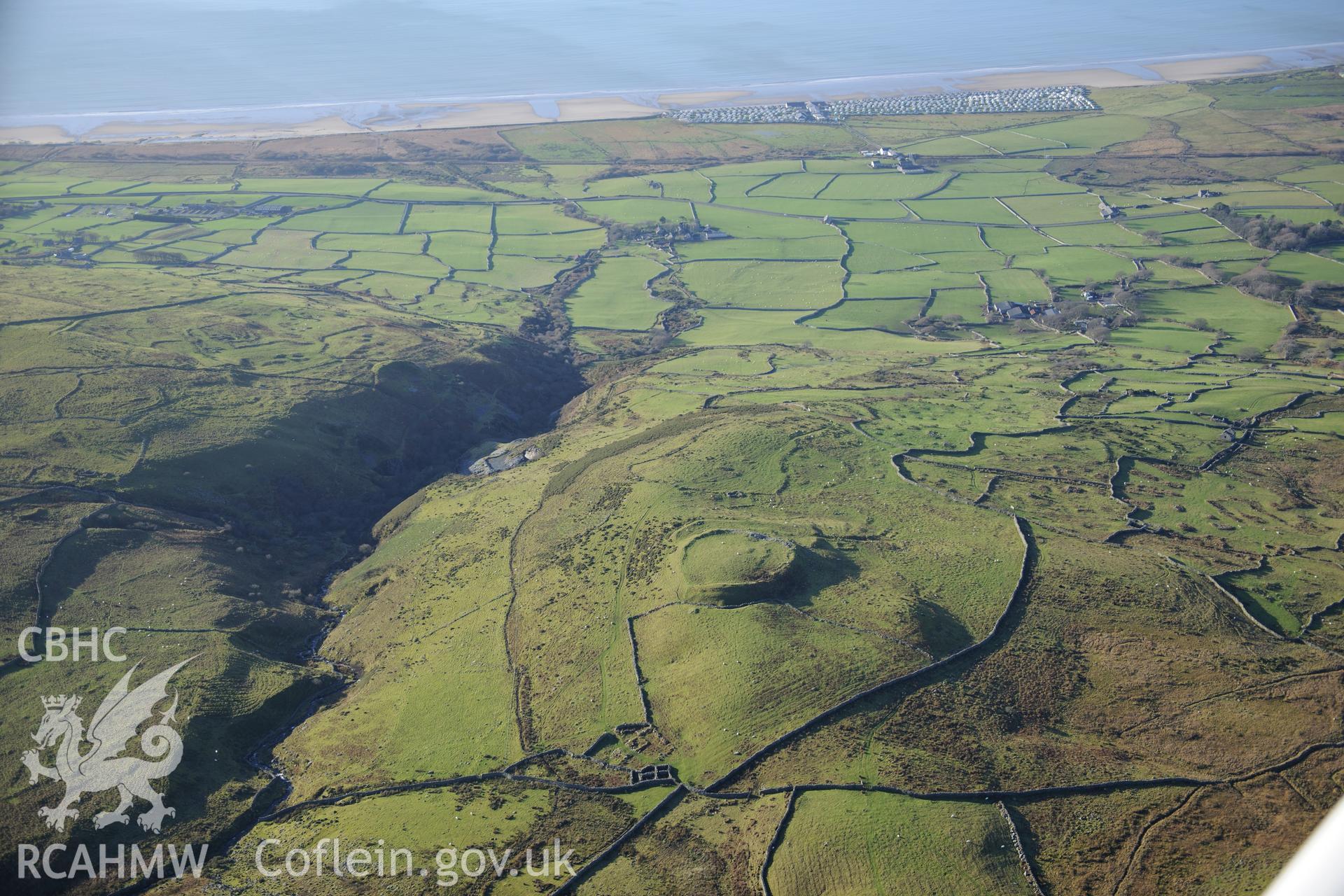 RCAHMW colour oblique photograph of Pen y Dinas, hillfort and upland landscape. Taken by Toby Driver on 10/12/2012.