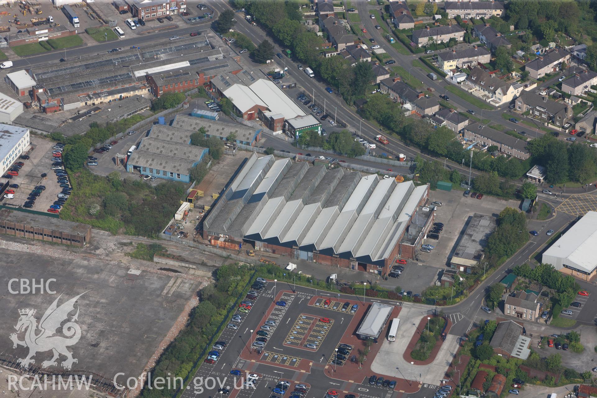 RCAHMW colour oblique photograph of General view of former War Materials factory, looking north west. Taken by Toby Driver on 24/05/2012.