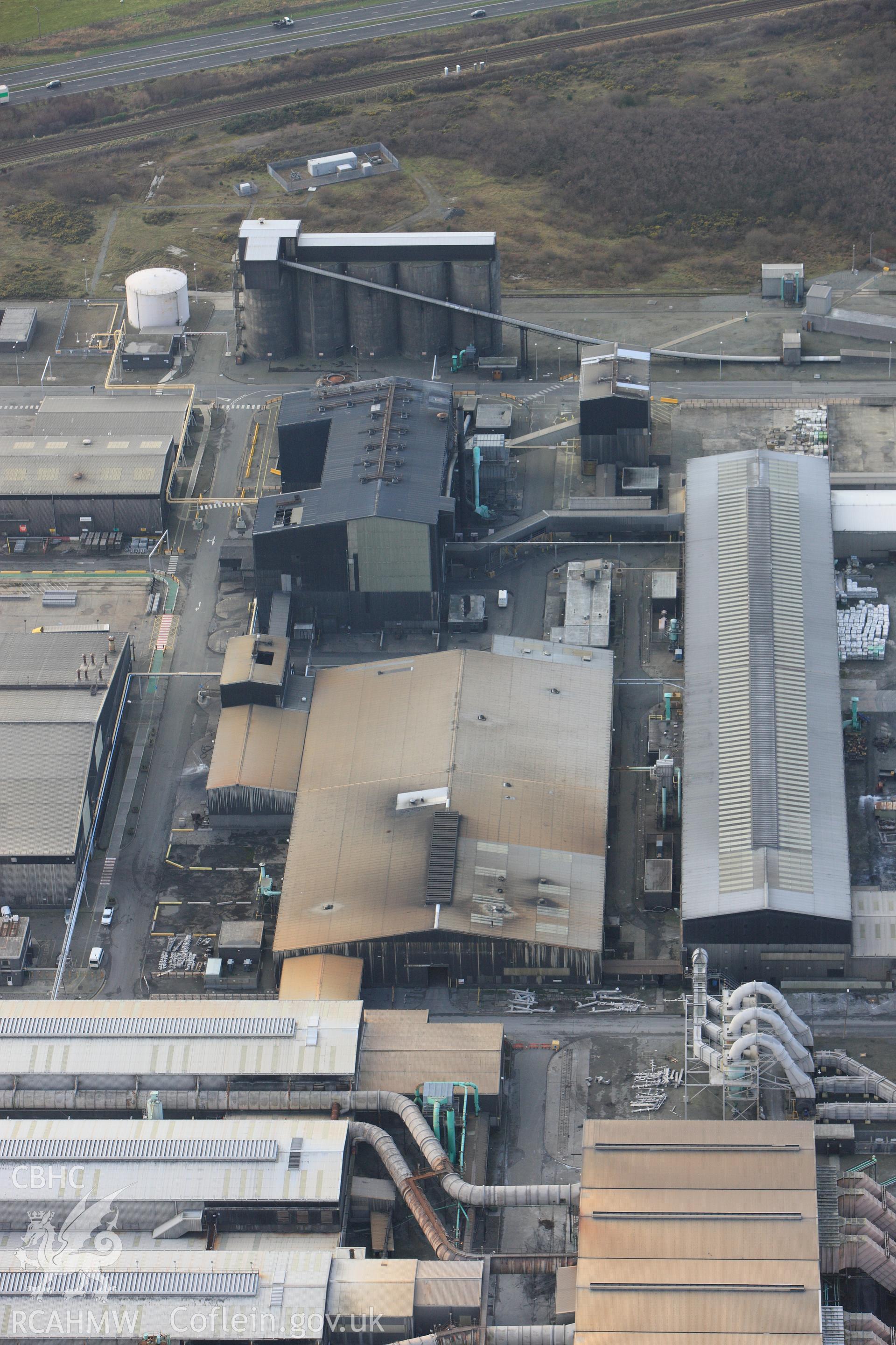 RCAHMW colour oblique photograph of Anglesey Aluminium Smelting Works, aerial survey prior to closure. Taken by Toby Driver on 13/01/2012.