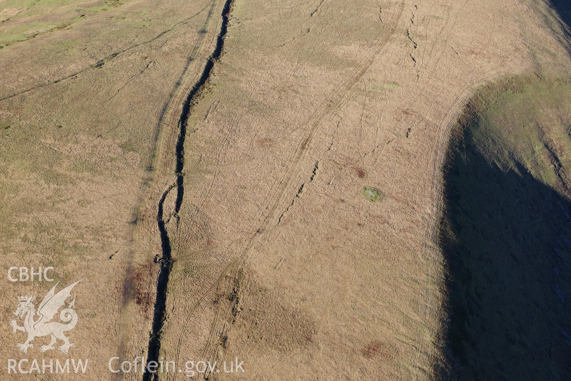 RCAHMW colour oblique photograph of Carn yr Hyrddod. Taken by Toby Driver on 28/11/2012.