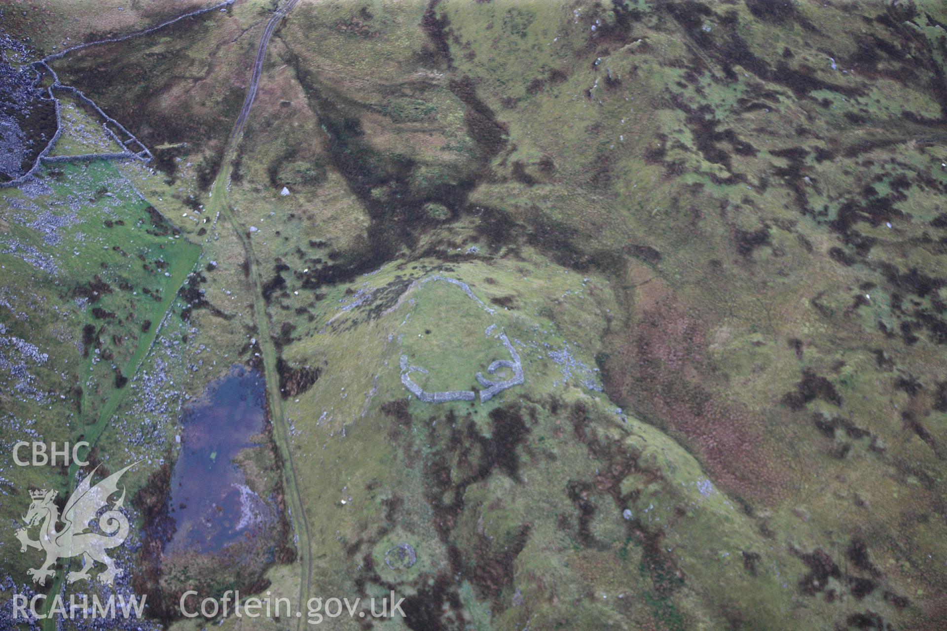 RCAHMW colour oblique photograph of Bryn y Castell hillfort. Taken by Toby Driver on 13/01/2012.