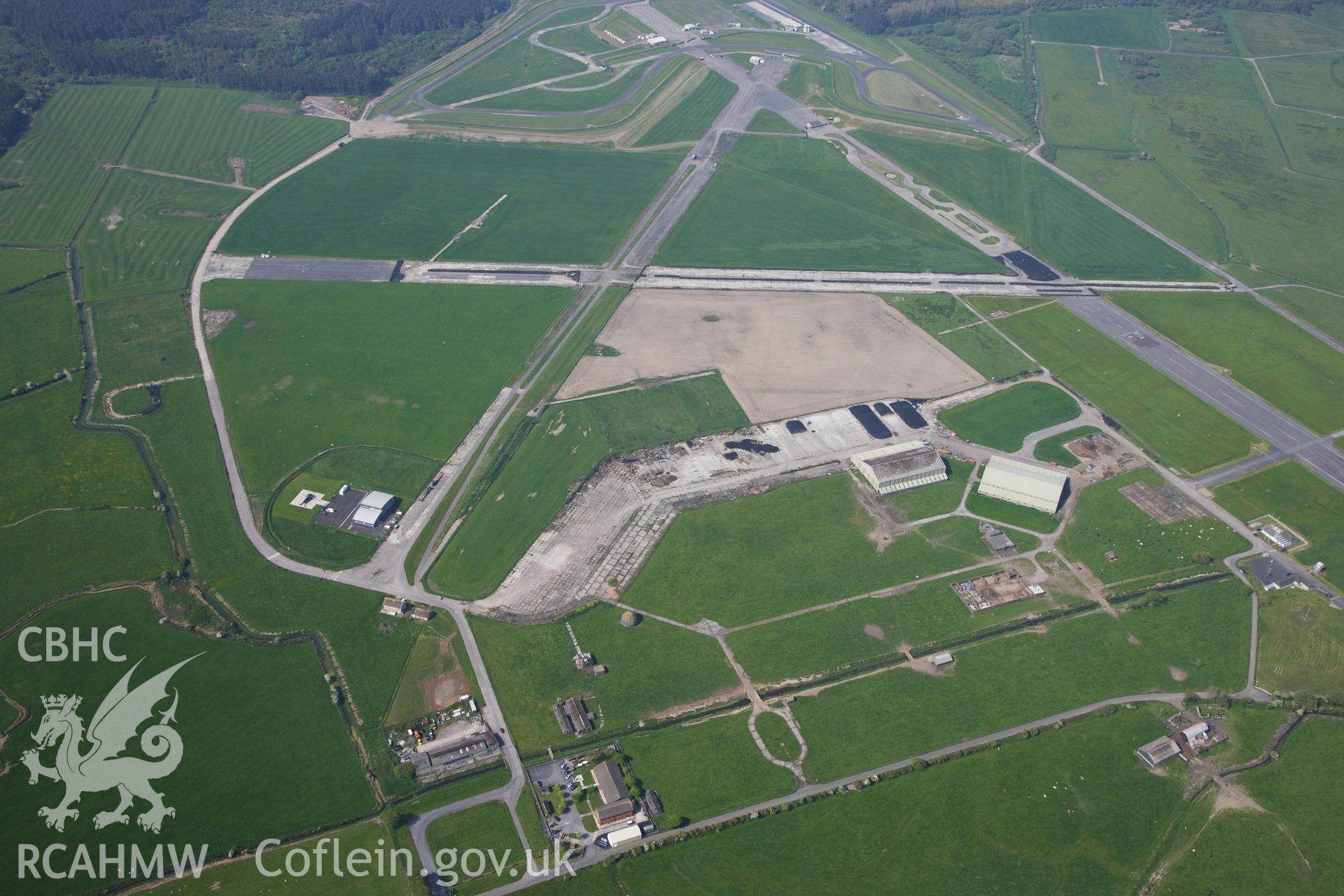 RCAHMW colour oblique photograph of General view of dome gunnery trainer and decontamination building, looking south west. Taken by Toby Driver on 24/05/2012.