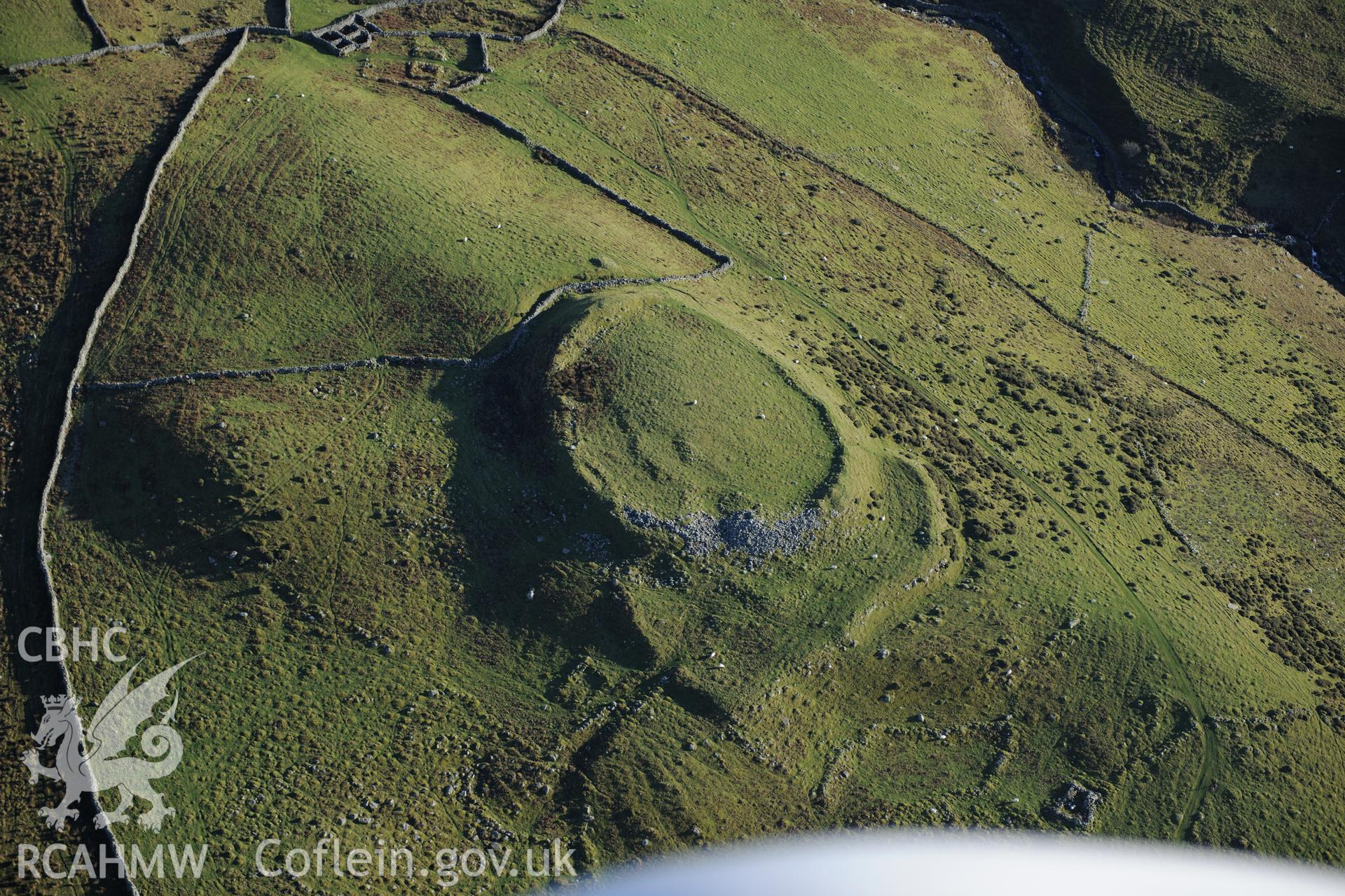 RCAHMW colour oblique photograph of Pen y Dinas hillfort. Taken by Toby Driver on 10/12/2012.