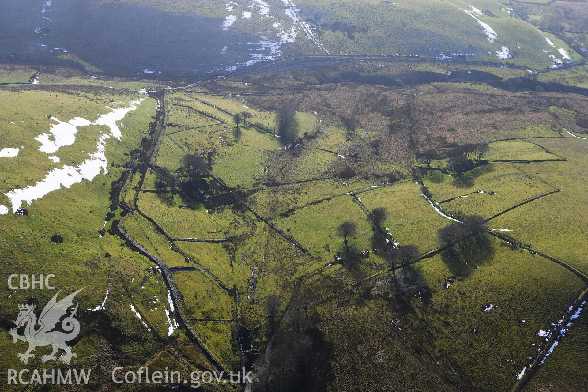RCAHMW colour oblique photograph of Gwar Ffynnon, Deserted Famsteads. Taken by Toby Driver on 07/02/2012.