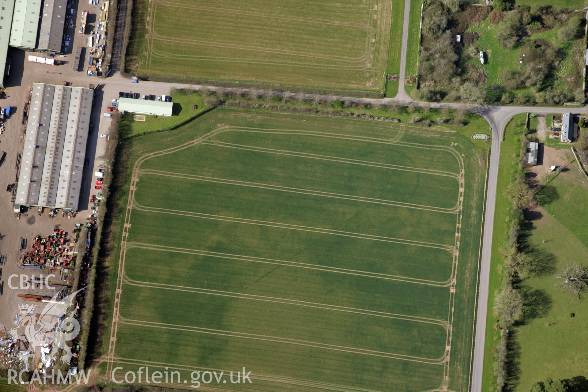 RCAHMW colour oblique photograph of Llancayo Farm barrow cemetery, southern cluster. Taken by Toby Driver and Oliver Davies on 28/03/2012.