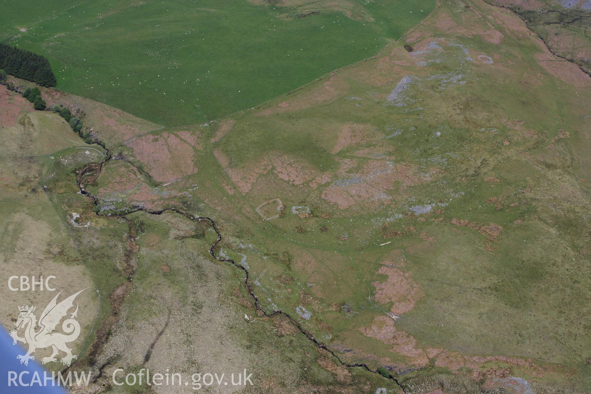RCAHMW colour oblique photograph of Hafotau Settlement on Esgair Gwar-Y-Cae. Taken by Toby Driver on 28/05/2012.