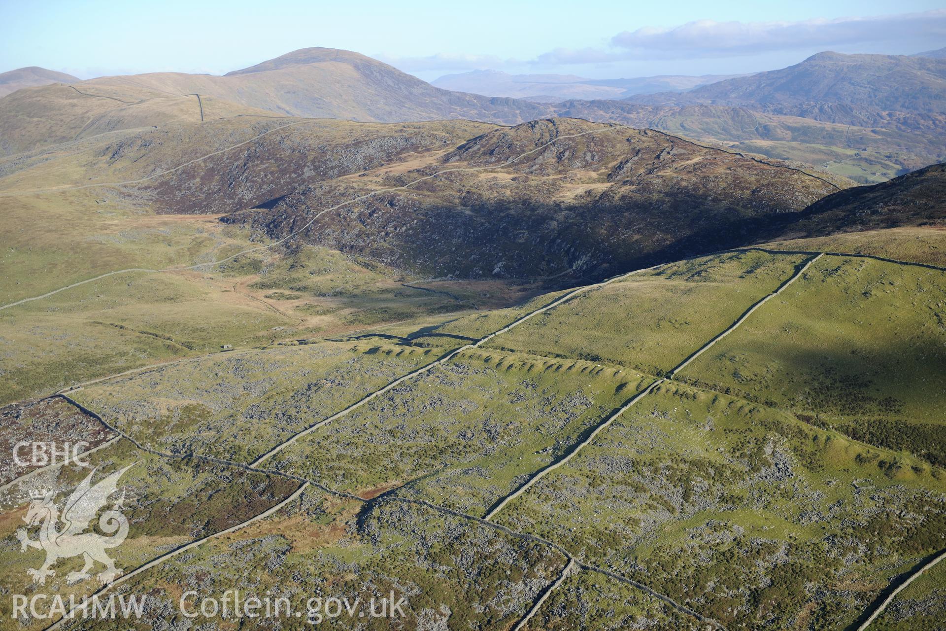 RCAHMW colour oblique photograph of Egryn and Hafotty managanese mines, and upland landscape. Taken by Toby Driver on 10/12/2012.