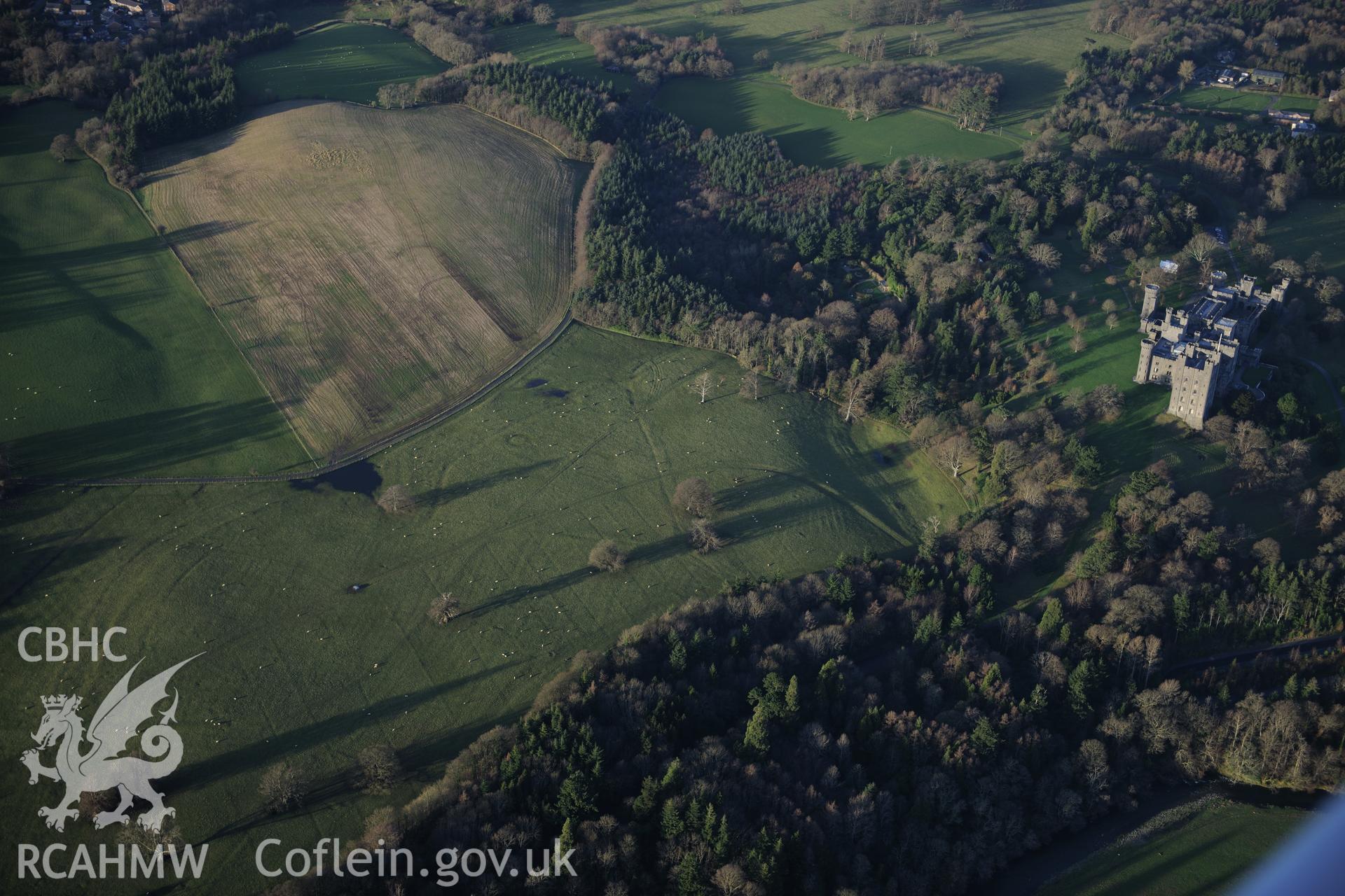 RCAHMW colour oblique photograph of Penrhyn Park earthworks. Taken by Toby Driver on 10/12/2012.