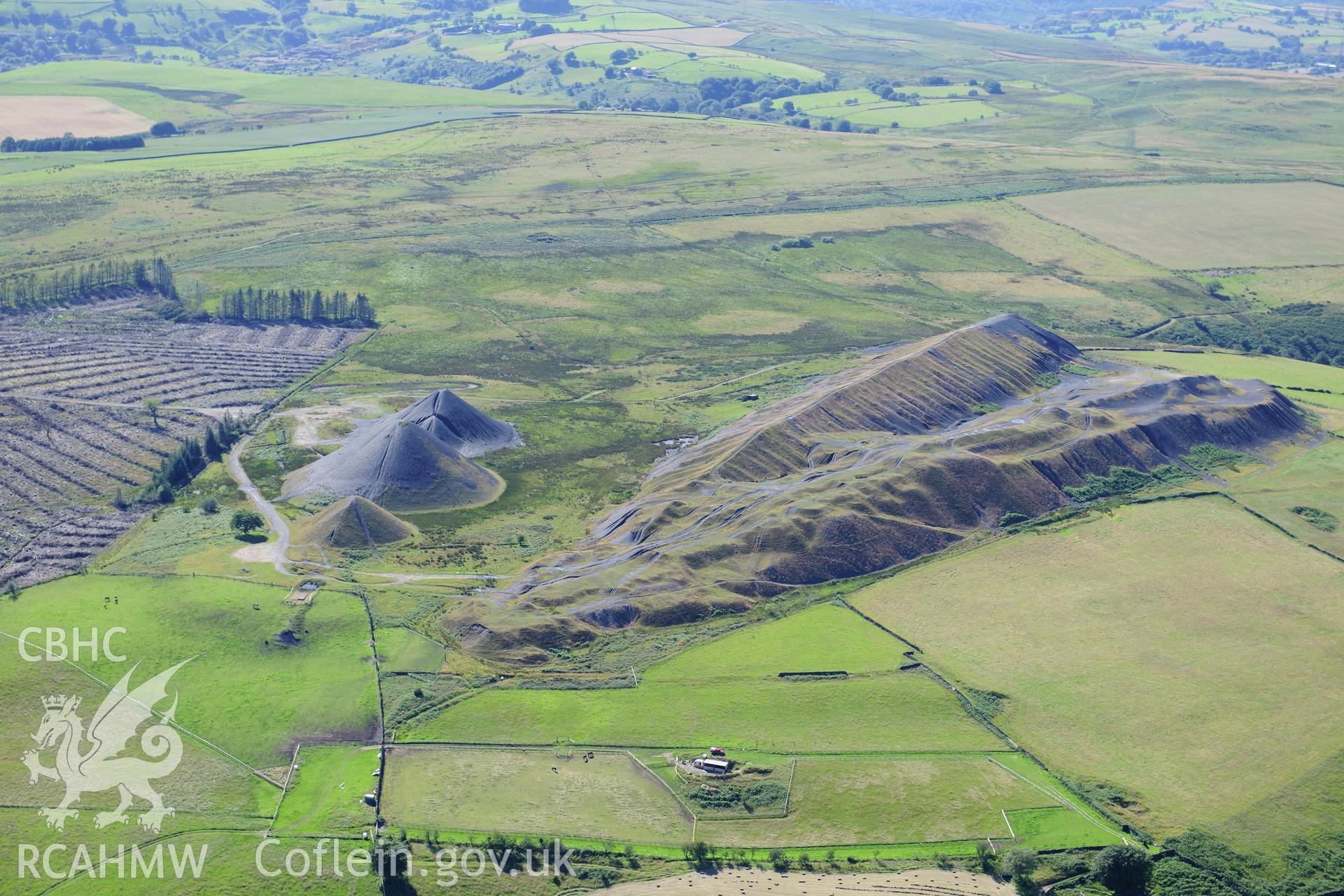RCAHMW colour oblique photograph of Llanbradach Colliery spoil tips. Taken by Toby Driver on 24/07/2012.