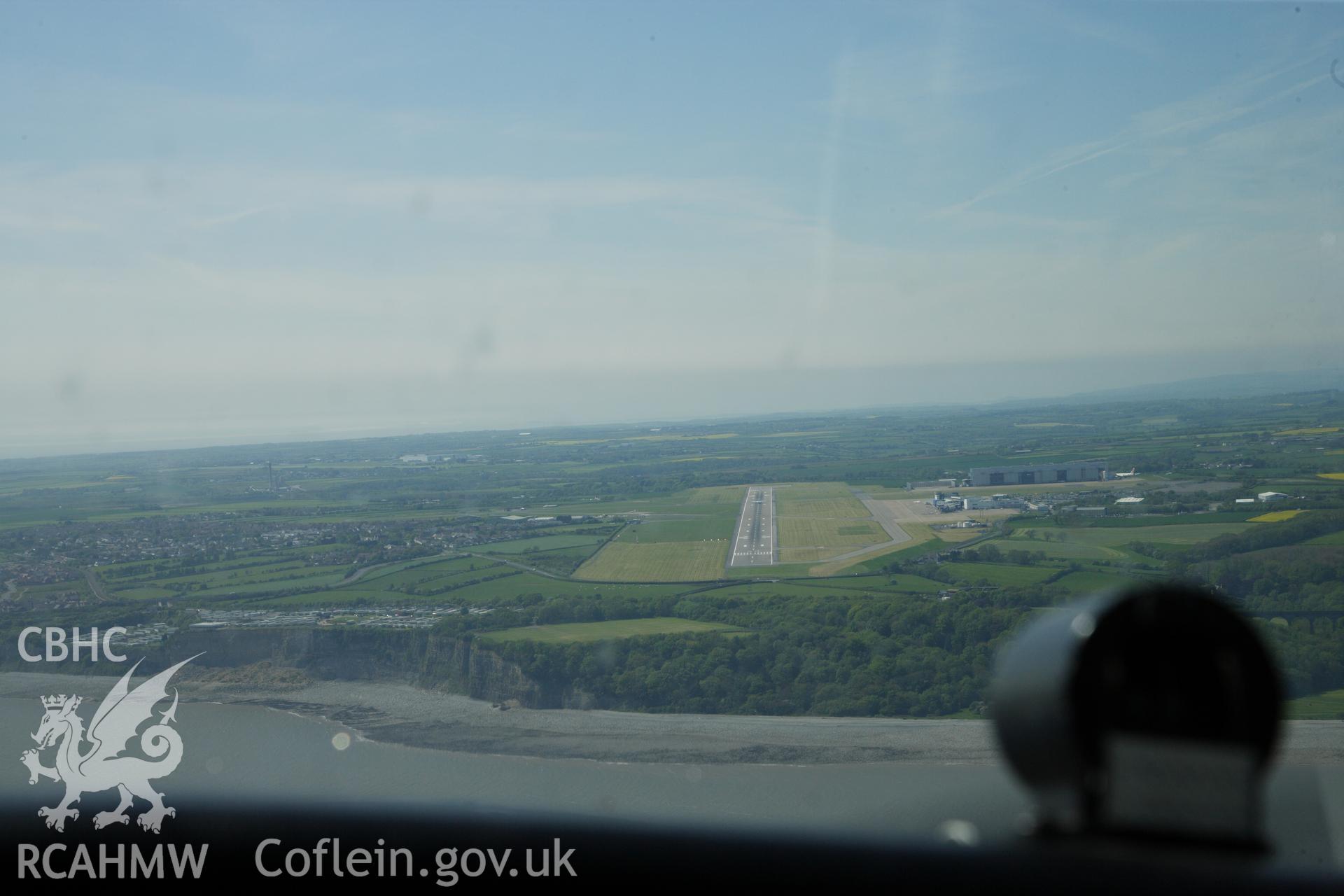 RCAHMW colour oblique photograph of Cardiff International Airport, pilot's view of runway approach. Taken by Toby Driver on 22/05/2012.