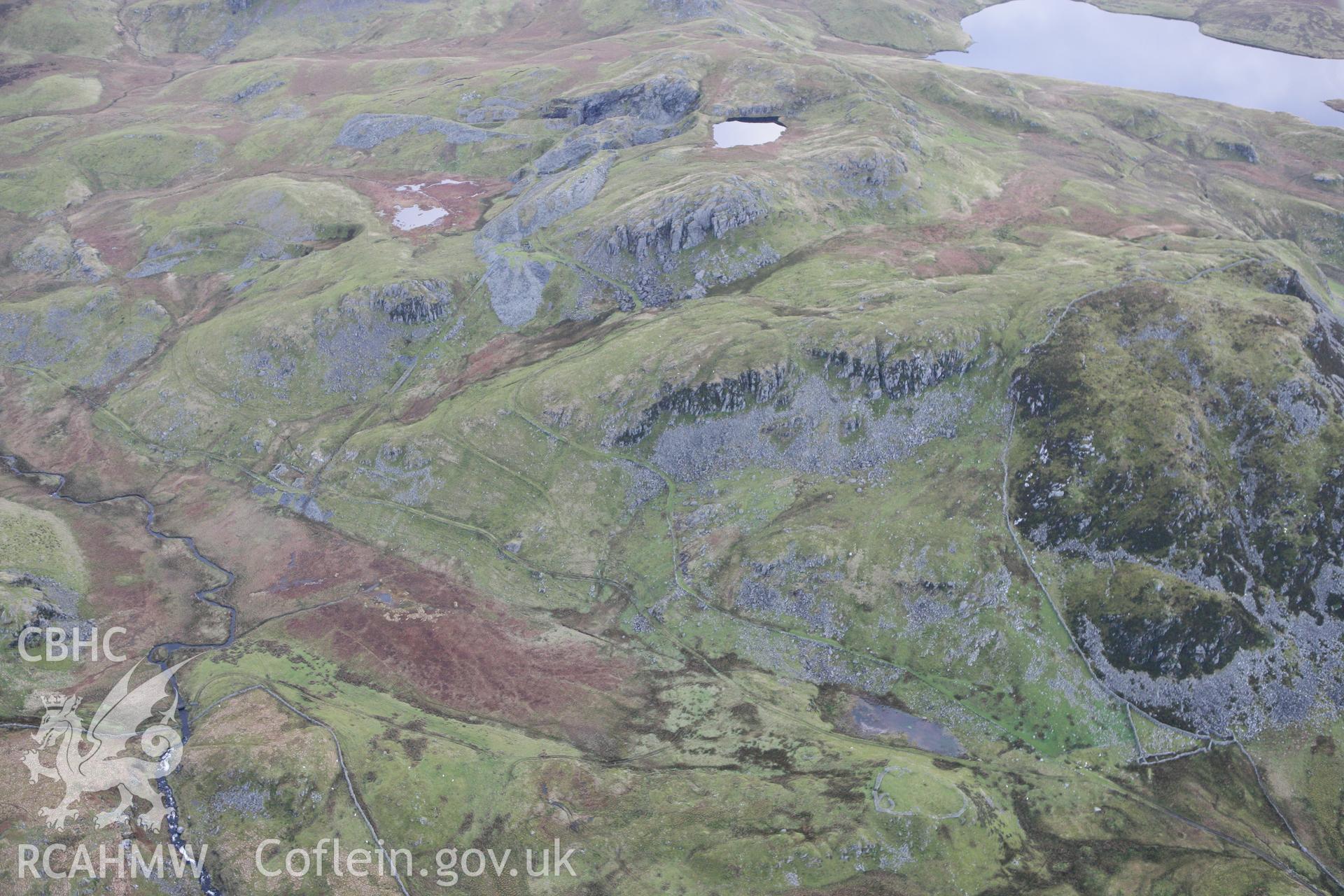 RCAHMW colour oblique photograph of Drum Quarry, view from north-west. Taken by Toby Driver on 13/01/2012.