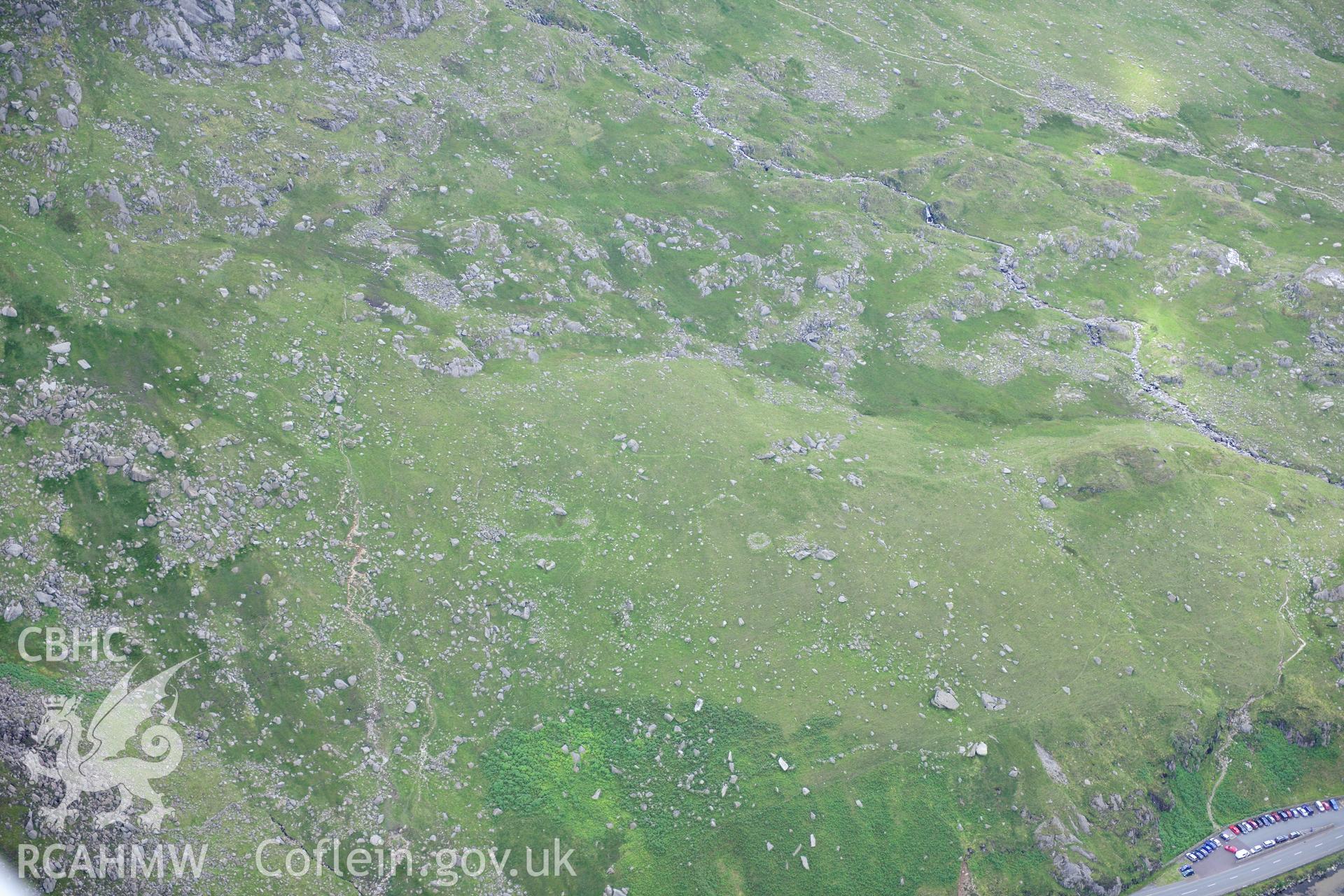 RCAHMW colour oblique photograph of hut circles, Nant Bochlwyd. Taken by Toby Driver on 10/08/2012.