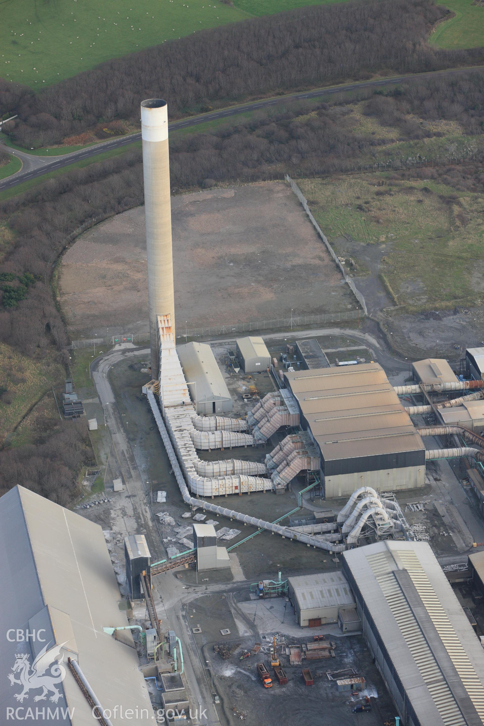 RCAHMW colour oblique photograph of Anglesey Aluminium Smelting Works, aerial survey prior to closure. Taken by Toby Driver on 13/01/2012.